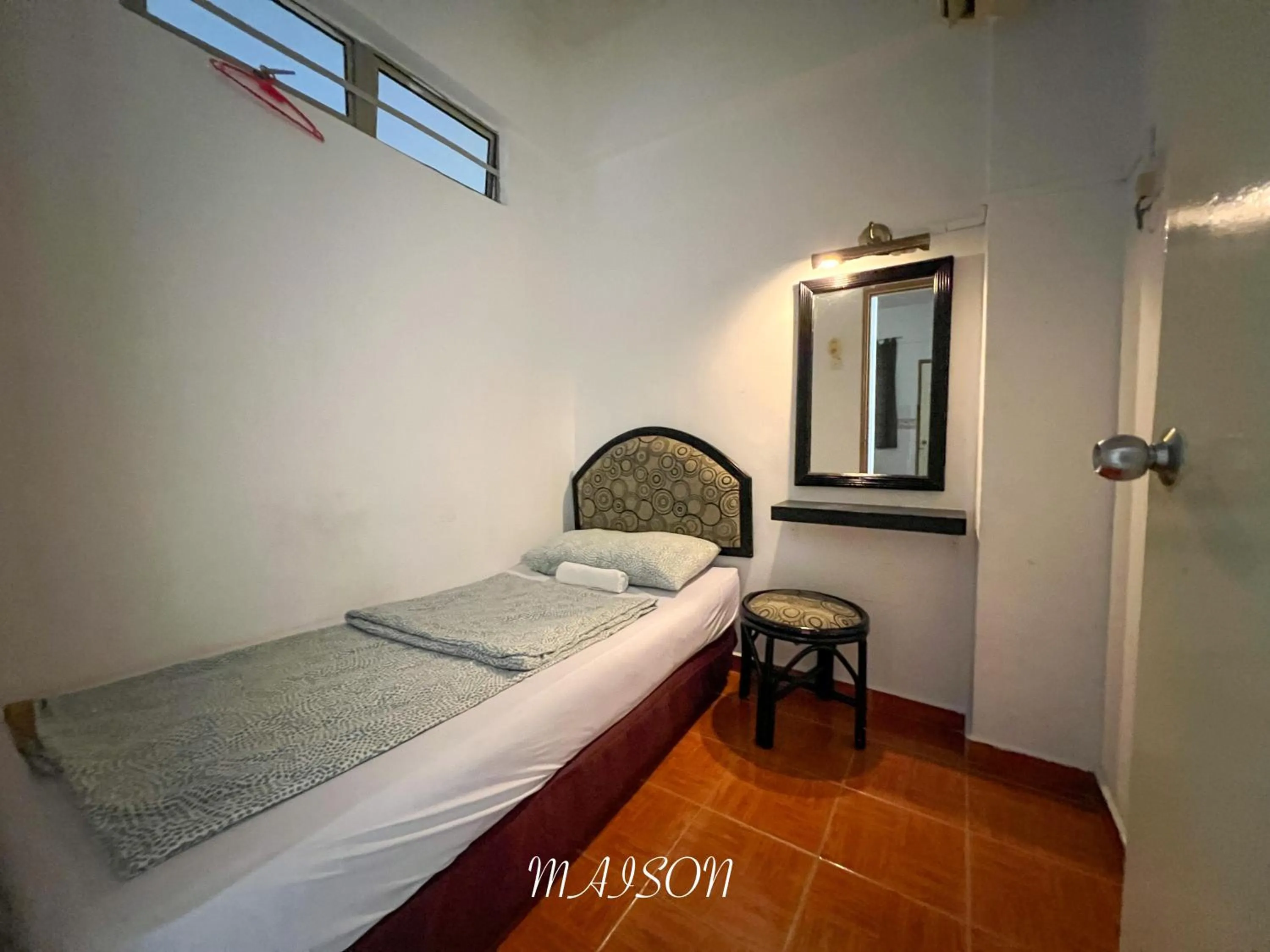 Bed in Maison Seaview Suites Port Dickson