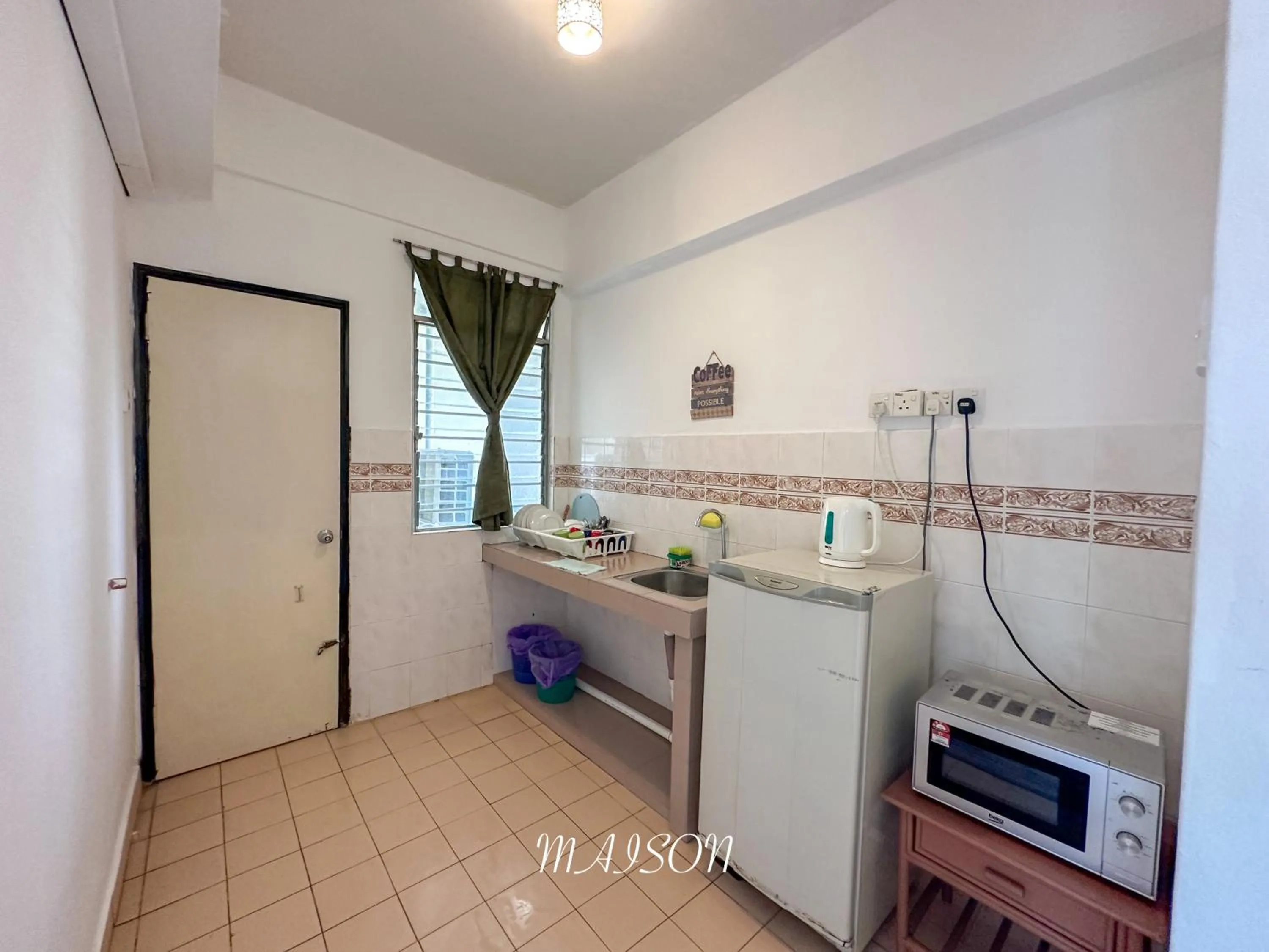 Kitchen or kitchenette in Maison Seaview Suites Port Dickson