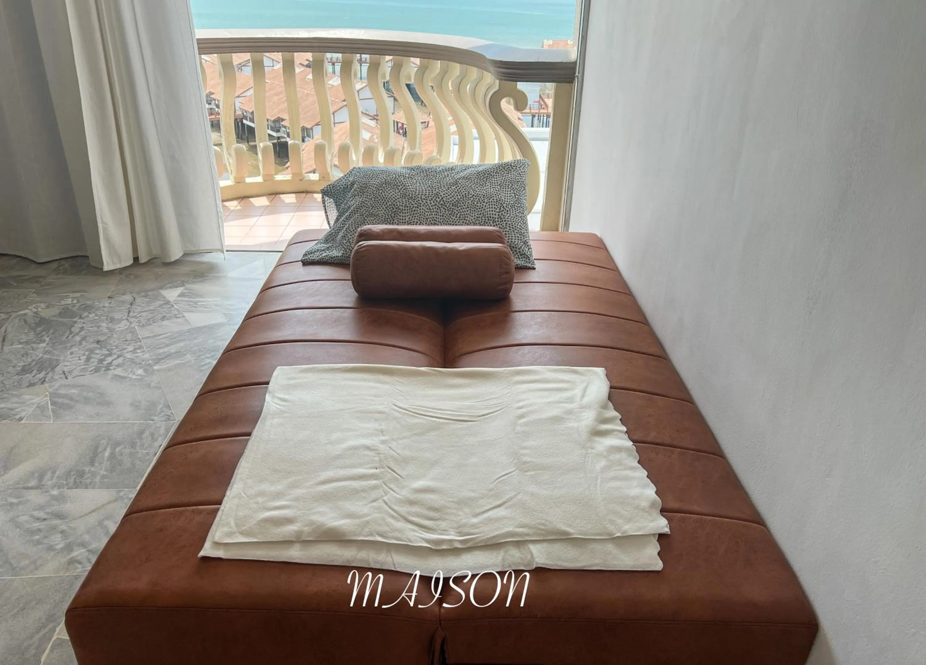 Bed in Maison Seaview Suites Port Dickson