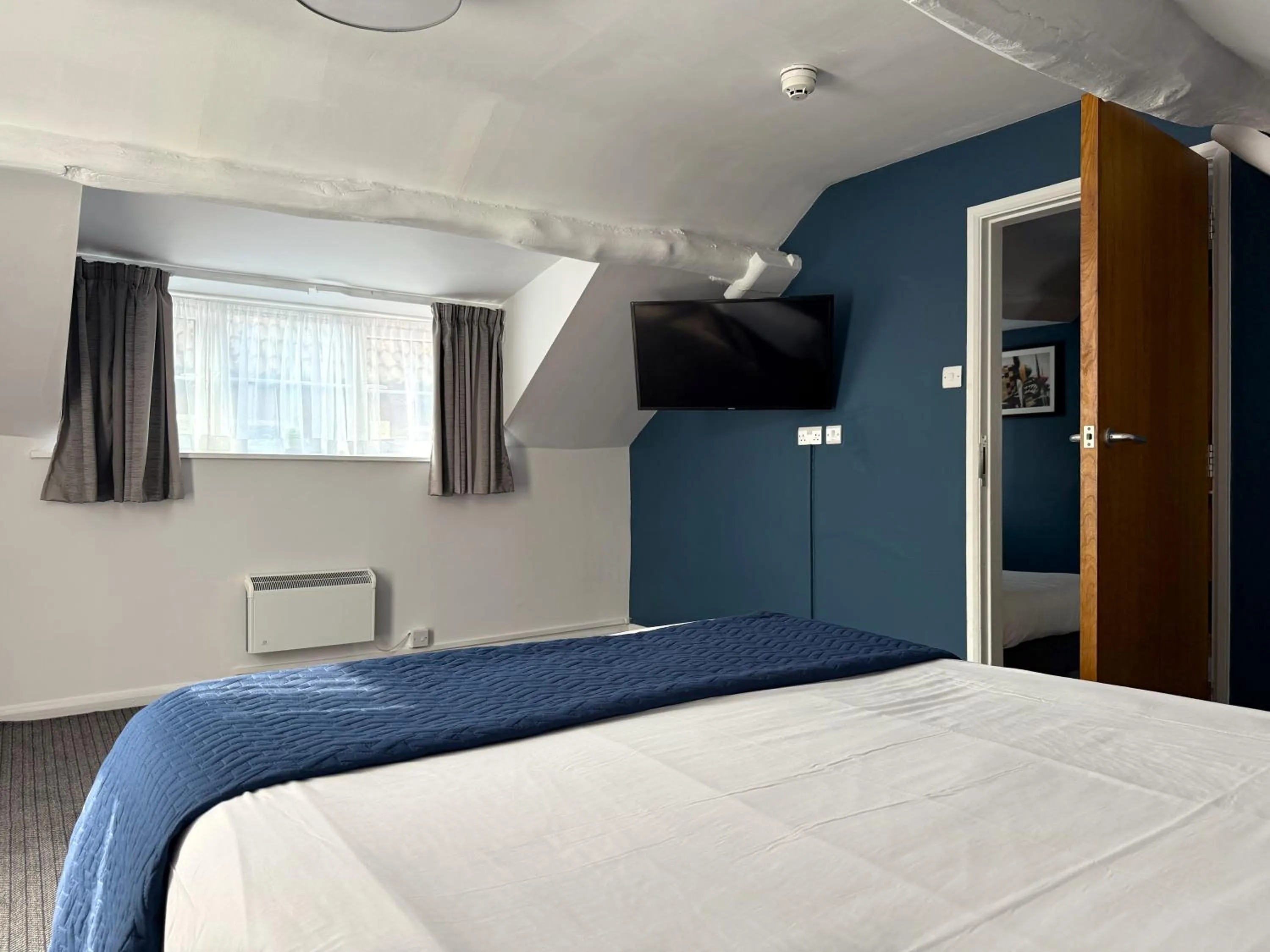 Bed in The Bowman by Greene King Inns