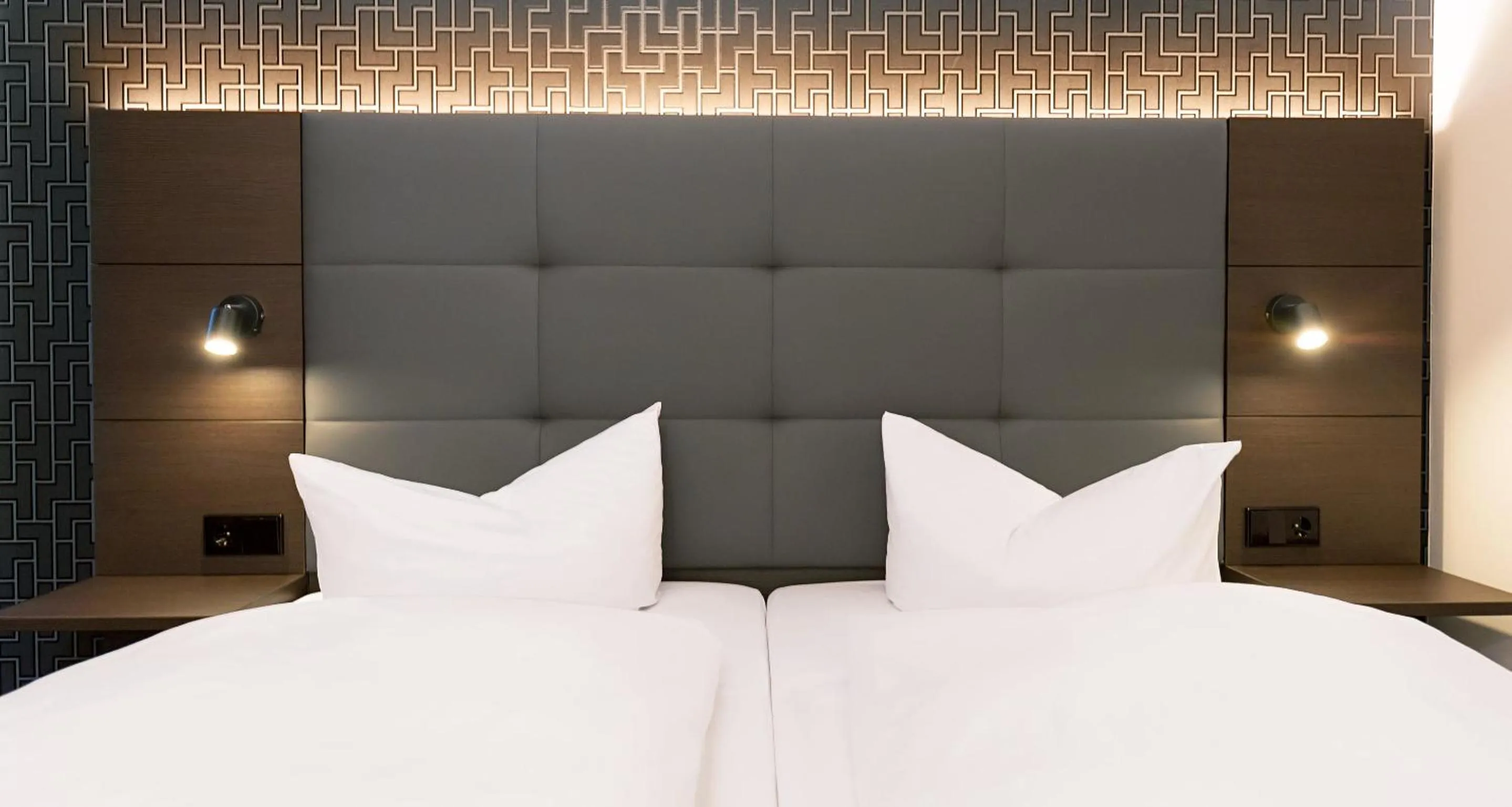 Bed in Victor's Residenz-Hotel Berlin Tegel