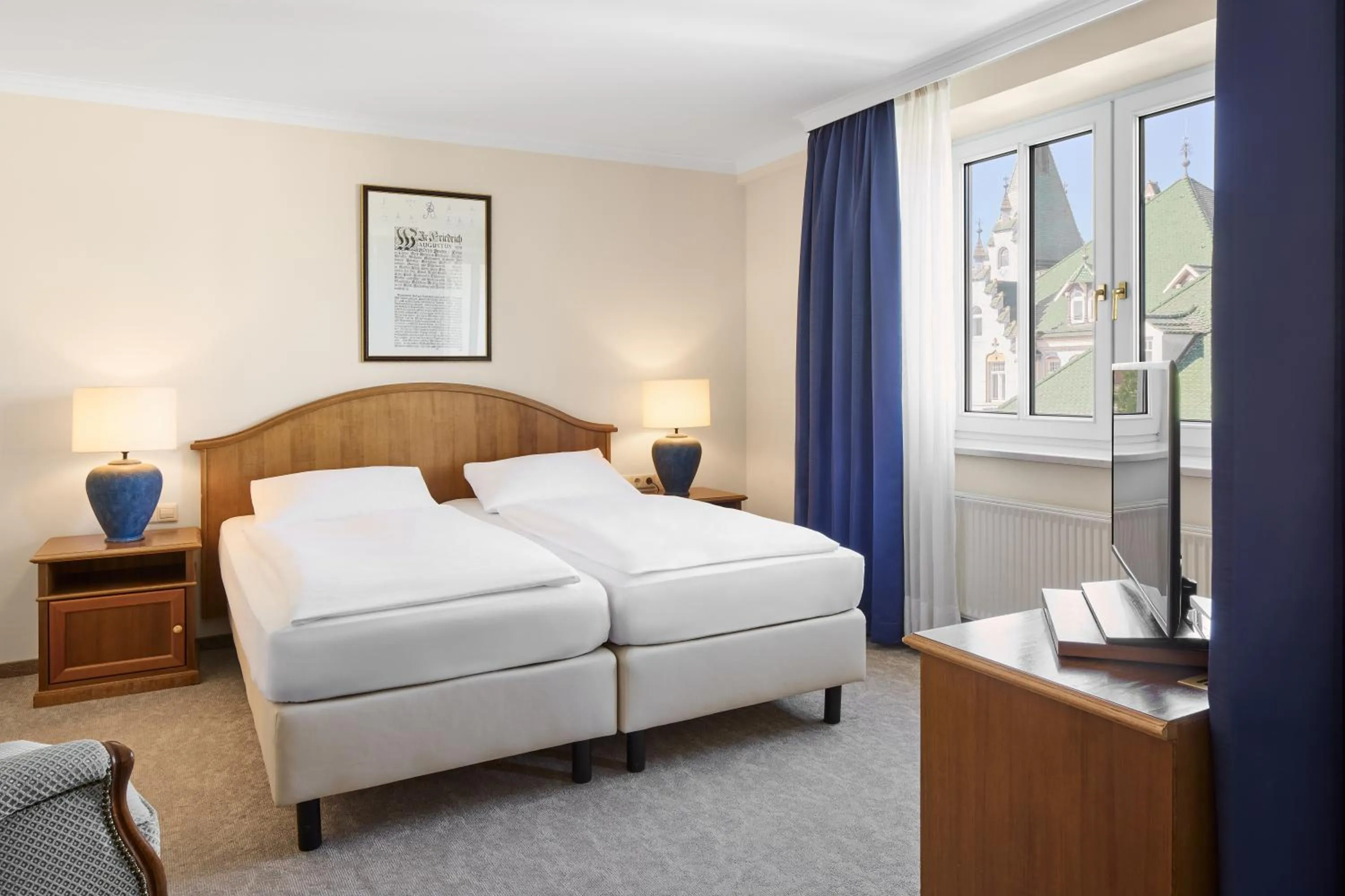 Photo of the whole room, Bed in Dorint Parkhotel Meißen