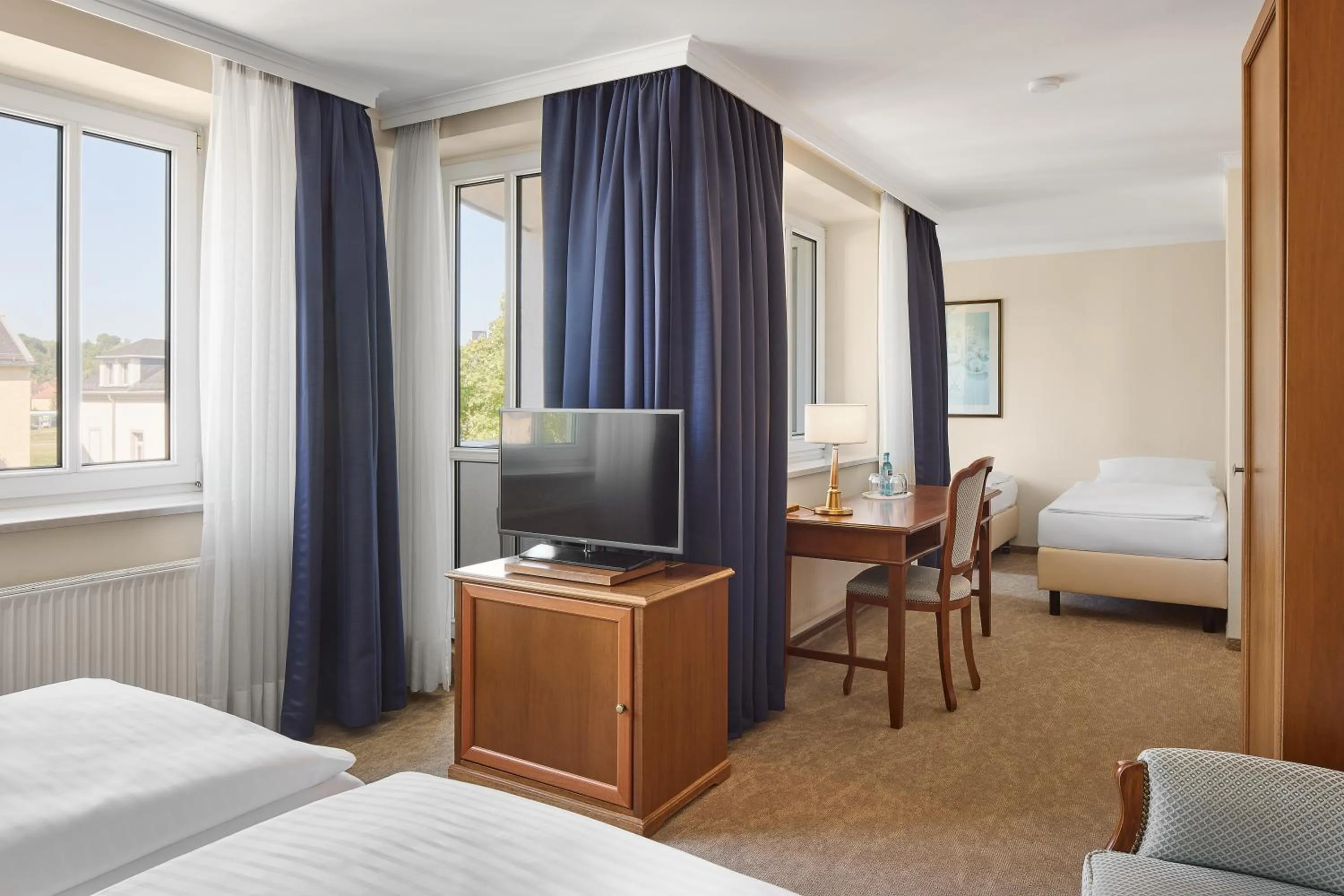 Photo of the whole room, Bed in Dorint Parkhotel Meißen