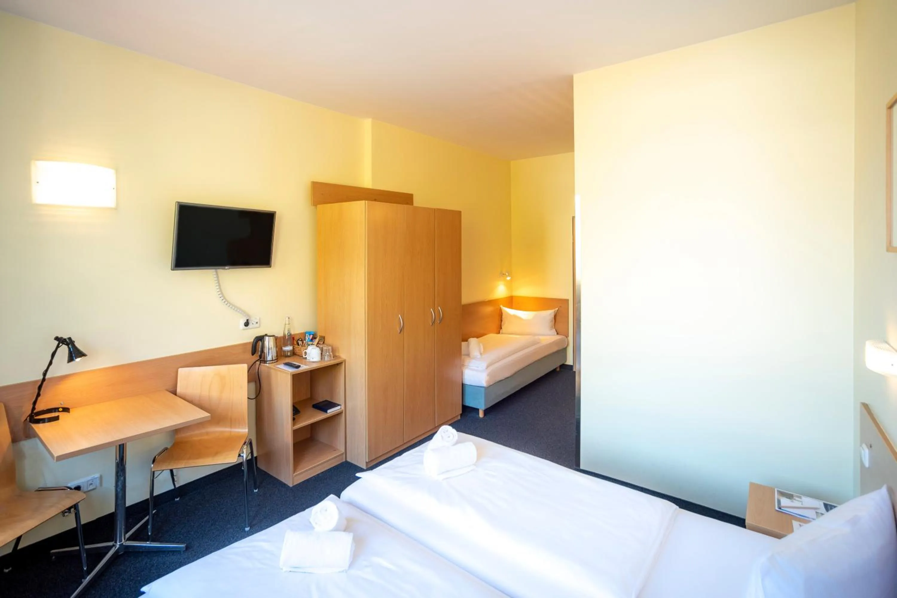 Photo of the whole room, Bed in Familienhotel Citylight