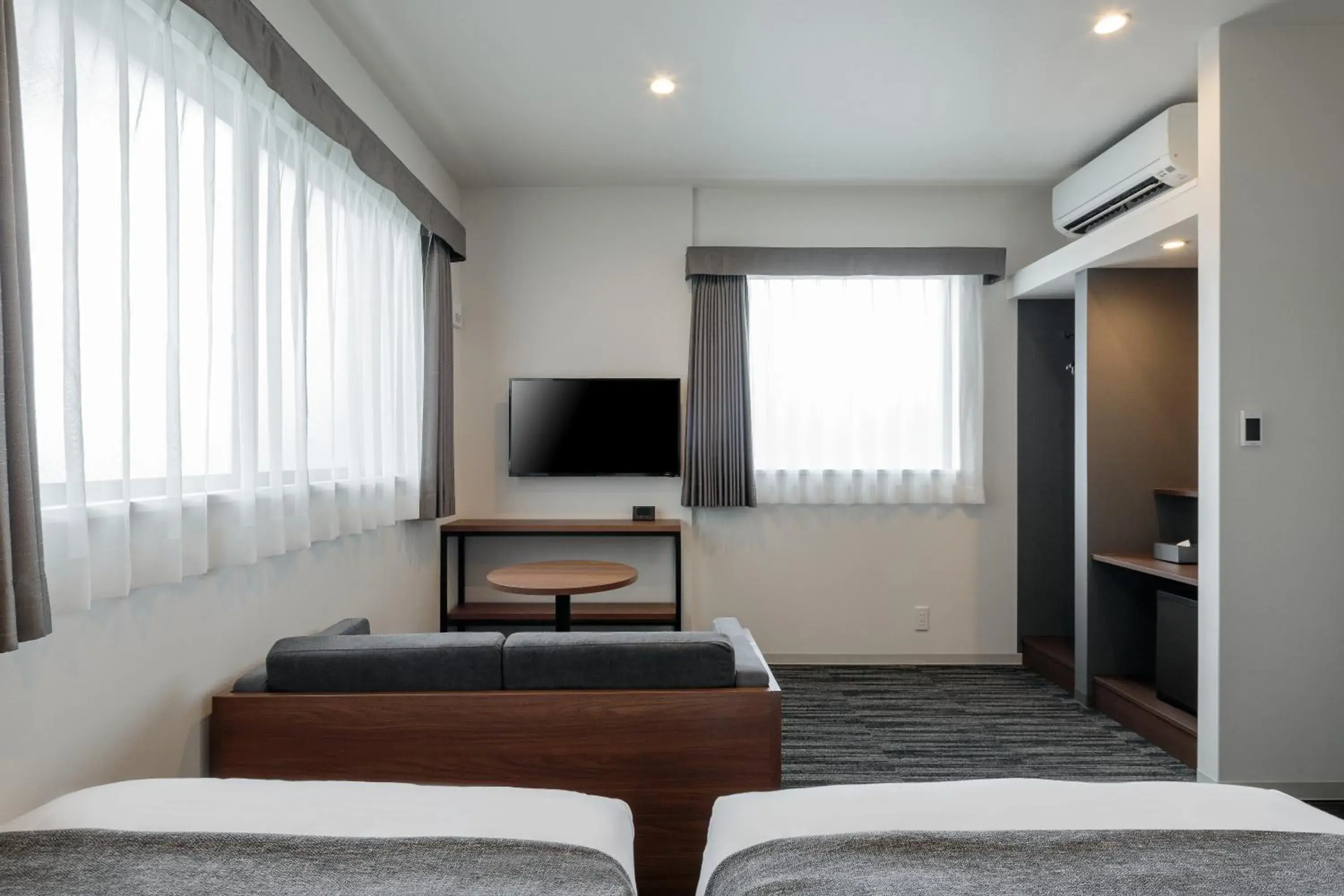 Seating area, Bed in M's Hotel Nijojo Oike Seating area, Bed in M's Hotel Nijojo Oike