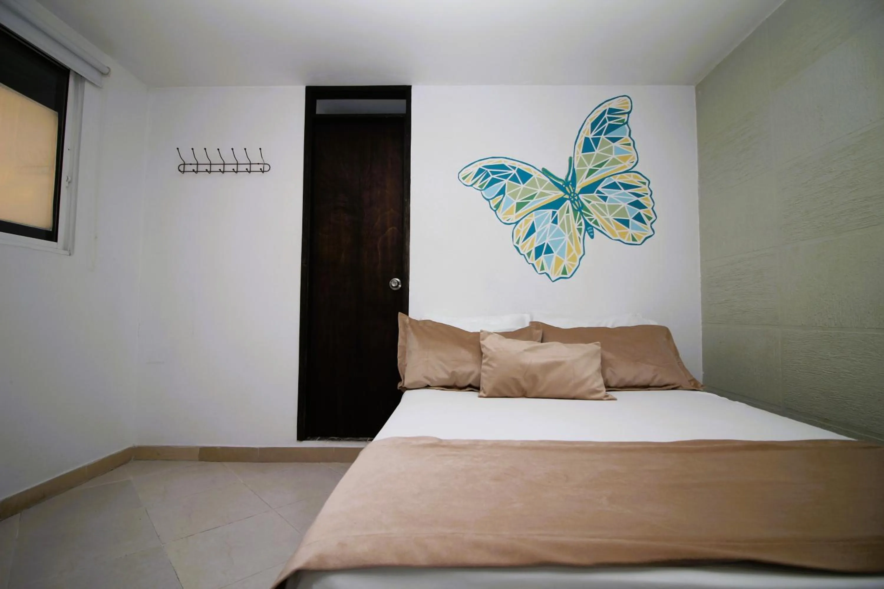 Bed in DAM Hotel Pereira