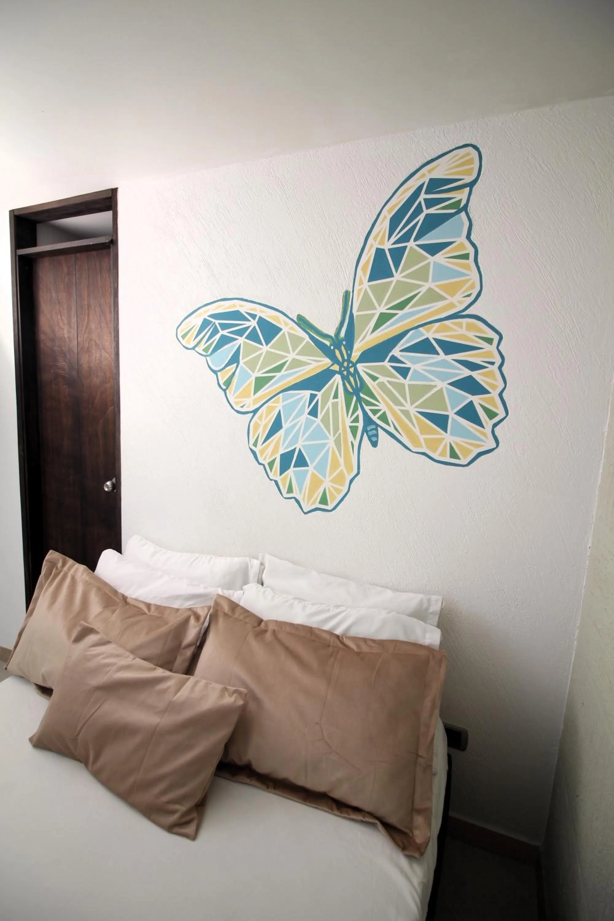 Decorative detail, Bed in DAM Hotel Pereira