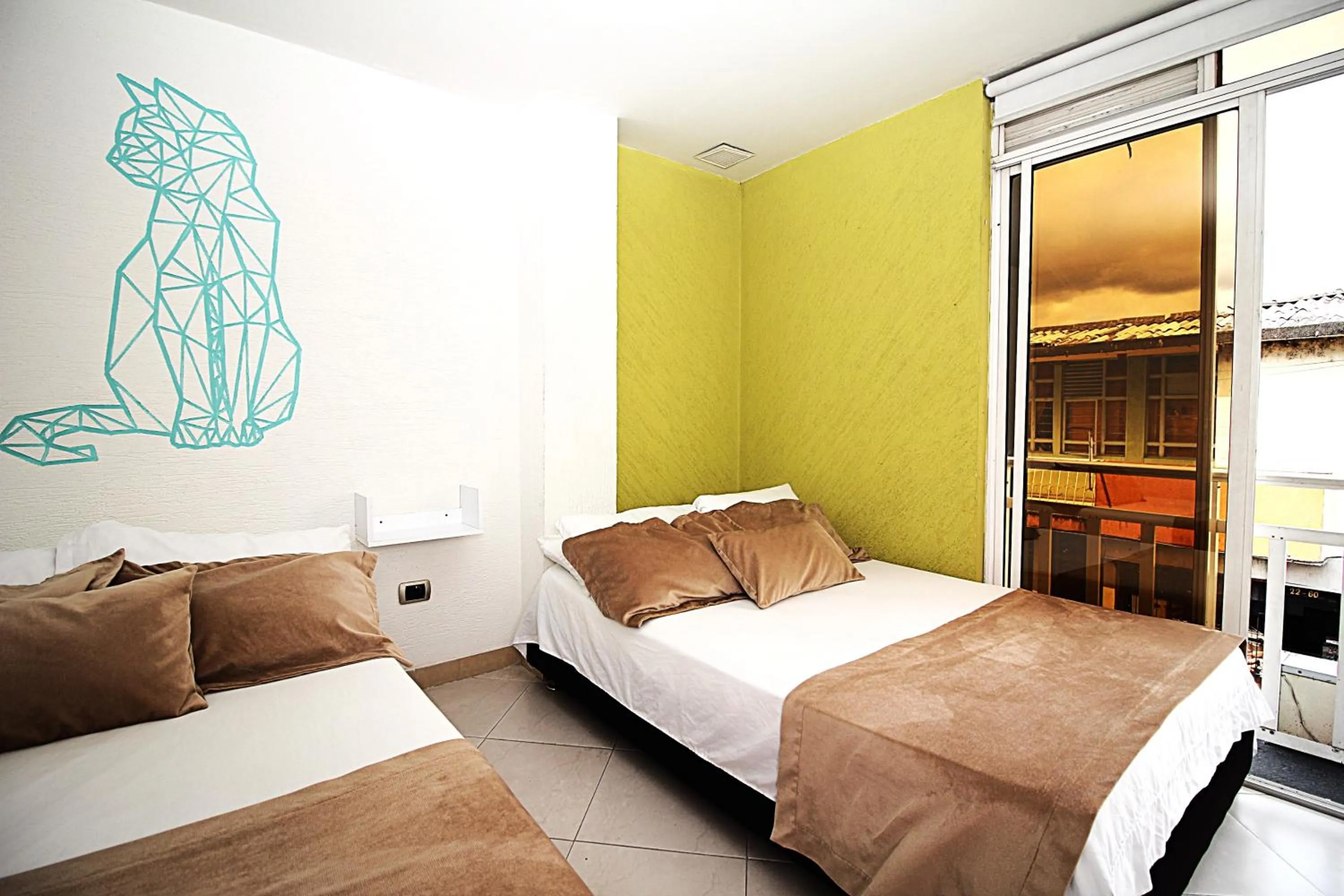 Bed in DAM Hotel Pereira