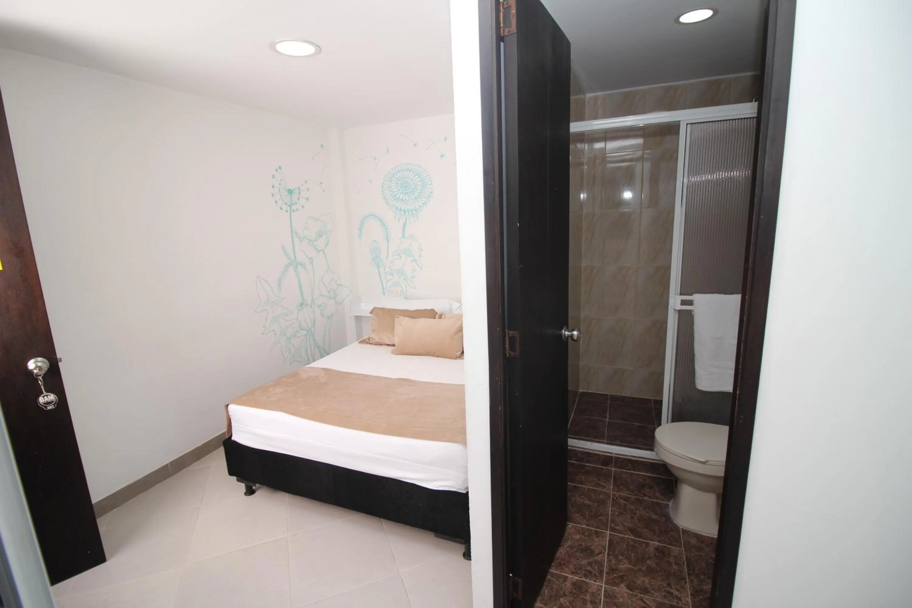 Bed in DAM Hotel Pereira