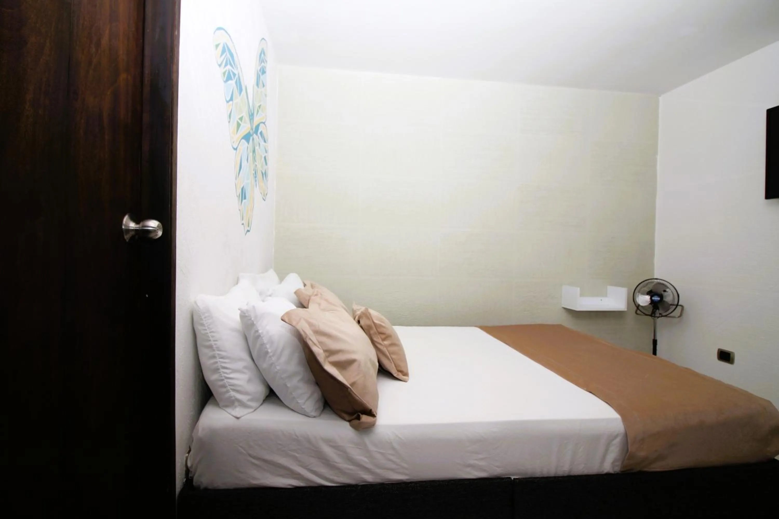 Bed in DAM Hotel Pereira