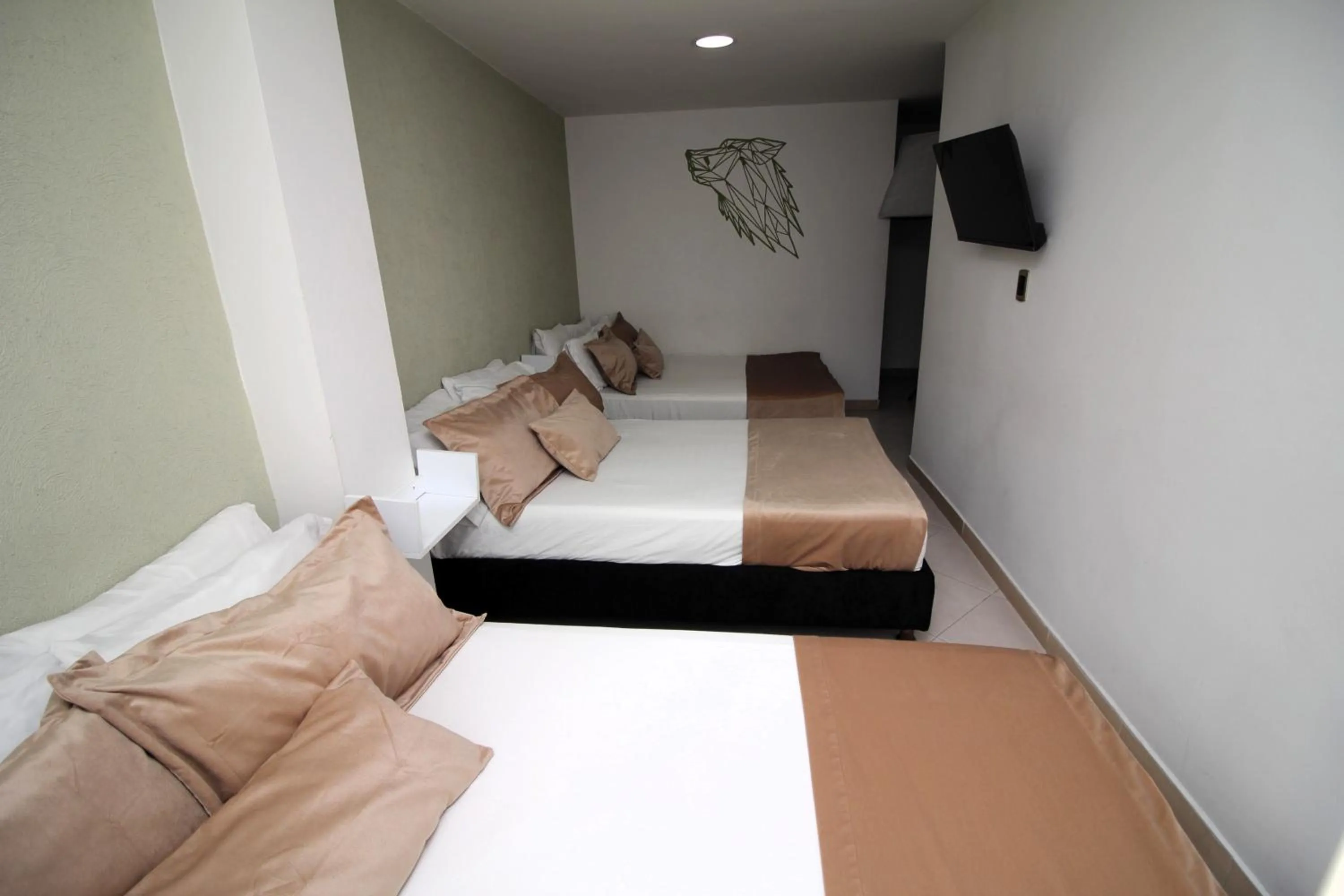 Bed in DAM Hotel Pereira