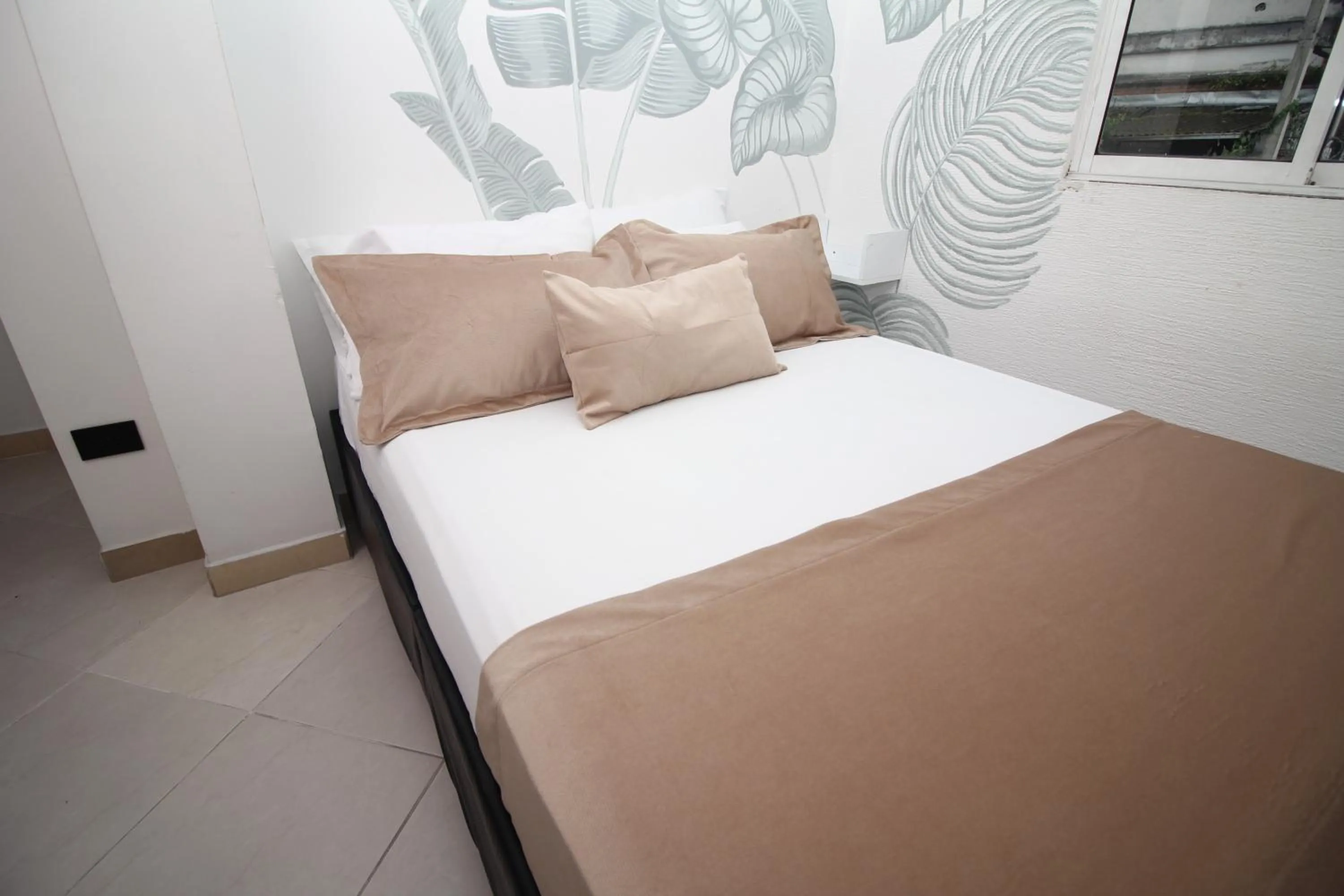Bed in DAM Hotel Pereira