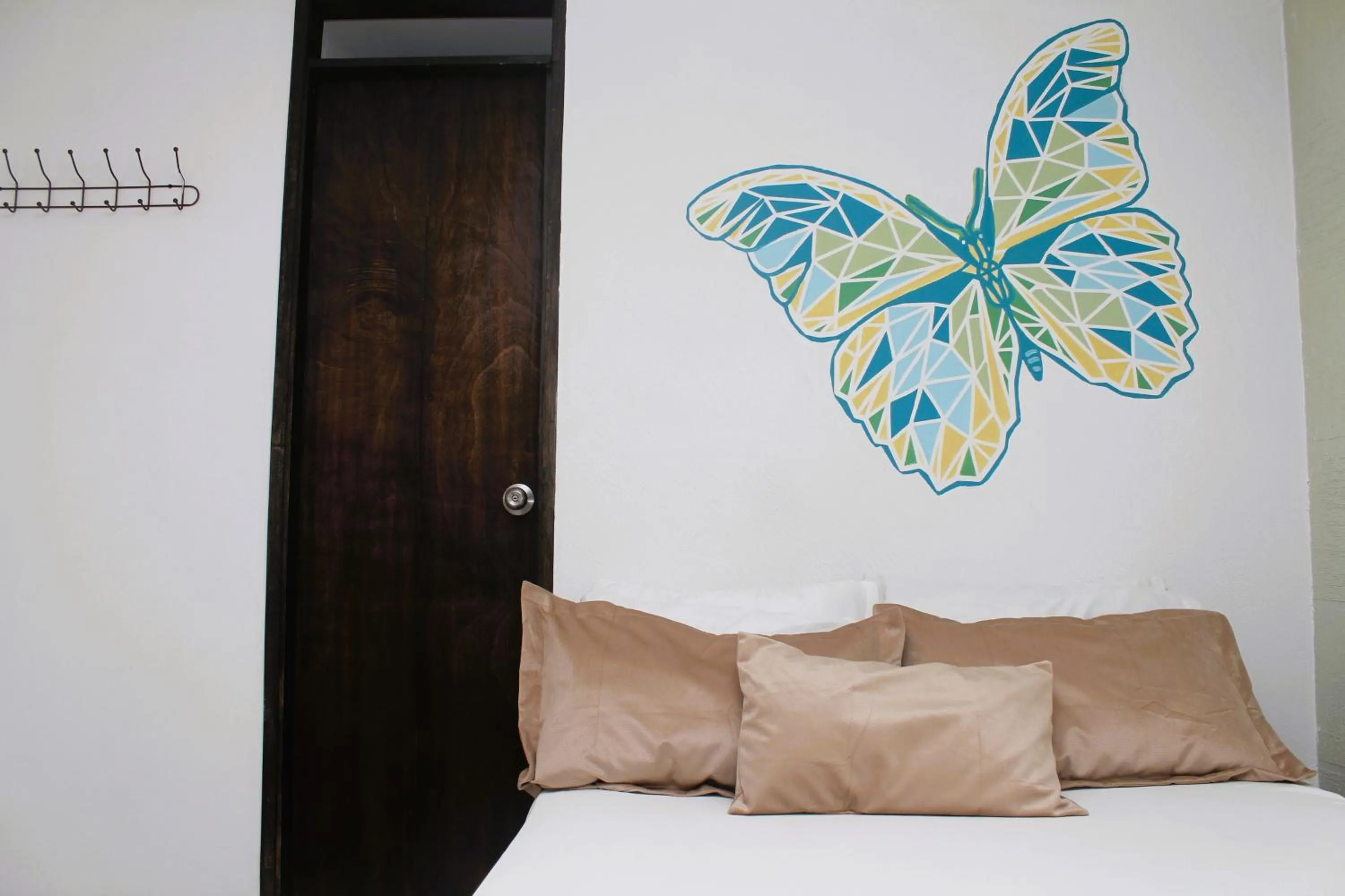 Decorative detail, Bed in DAM Hotel Pereira