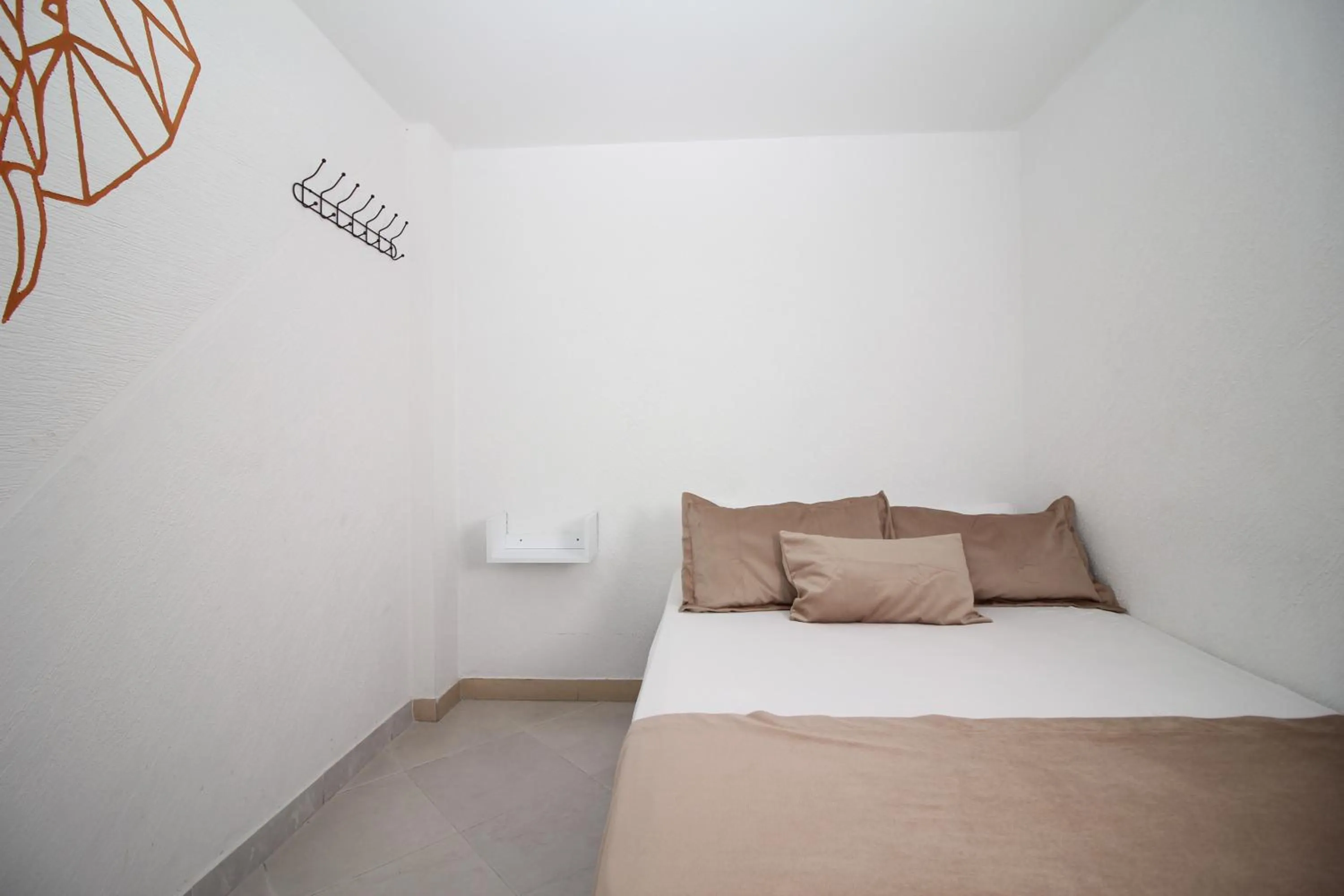 Bed in DAM Hotel Pereira