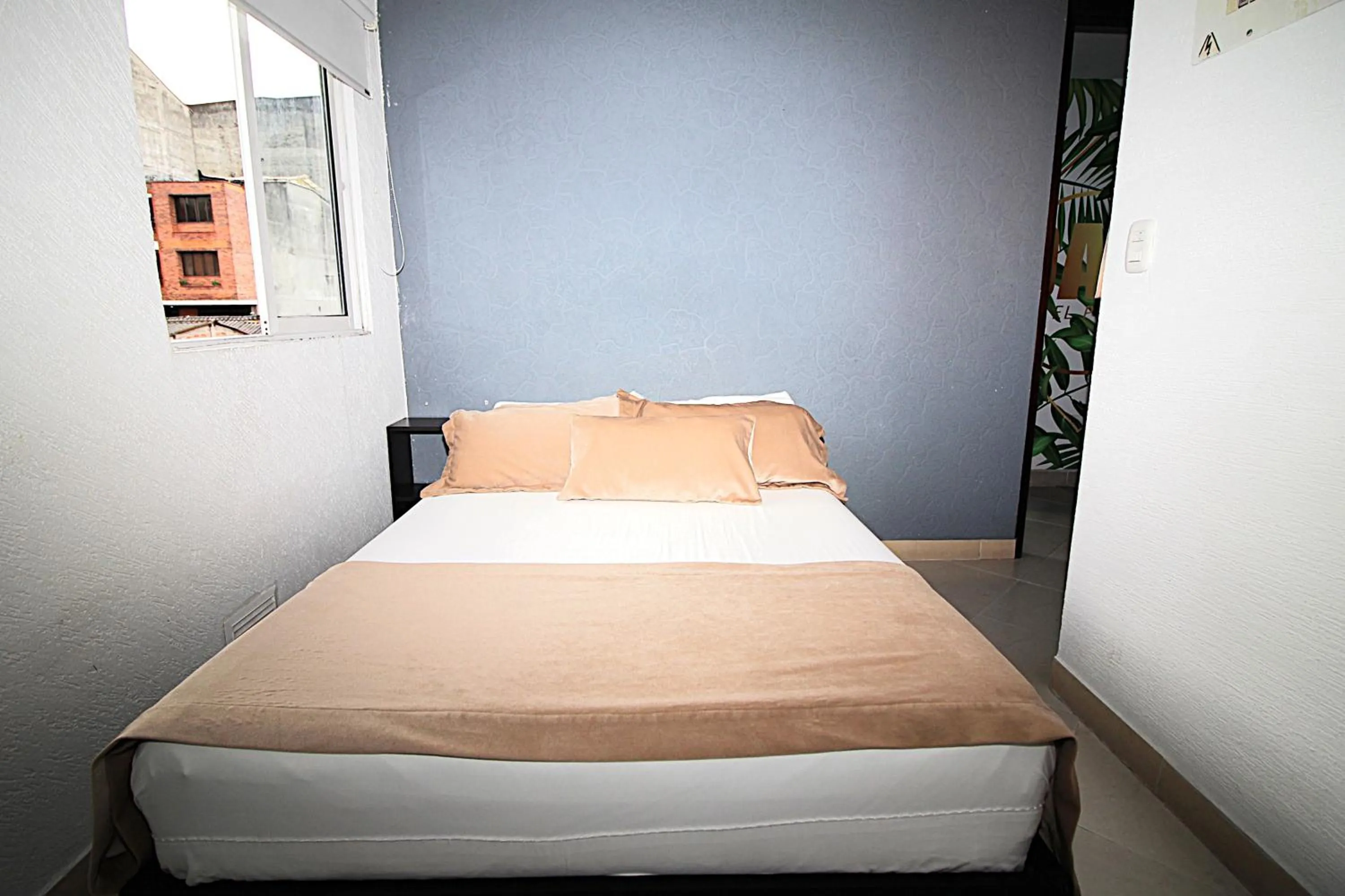 Bed in DAM Hotel Pereira