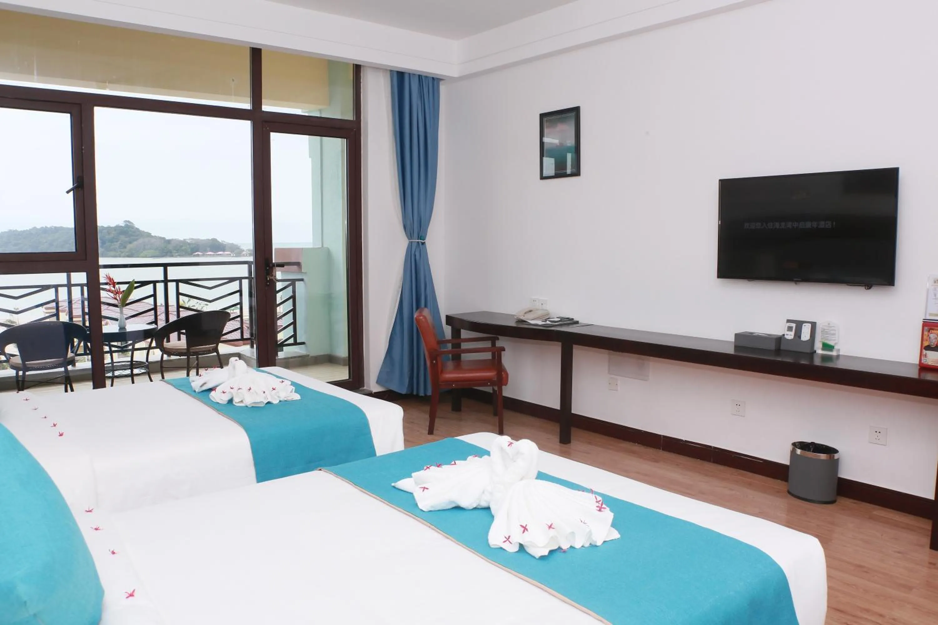 Sealong Bay ZhongQi Conifer Hotel 海龙湾中启康年酒店