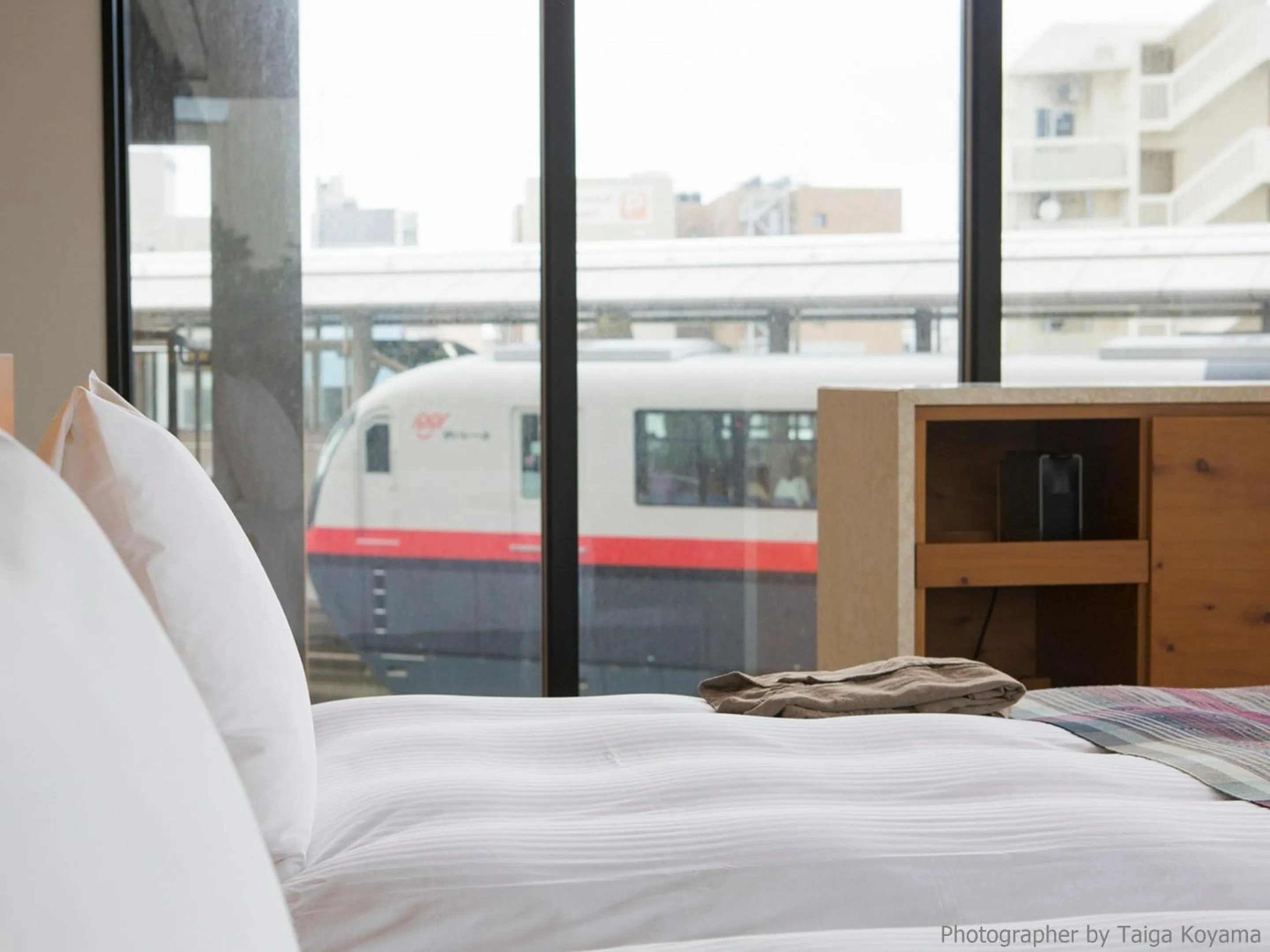 Text overlay, Bed in HOTEL STRATA NAHA