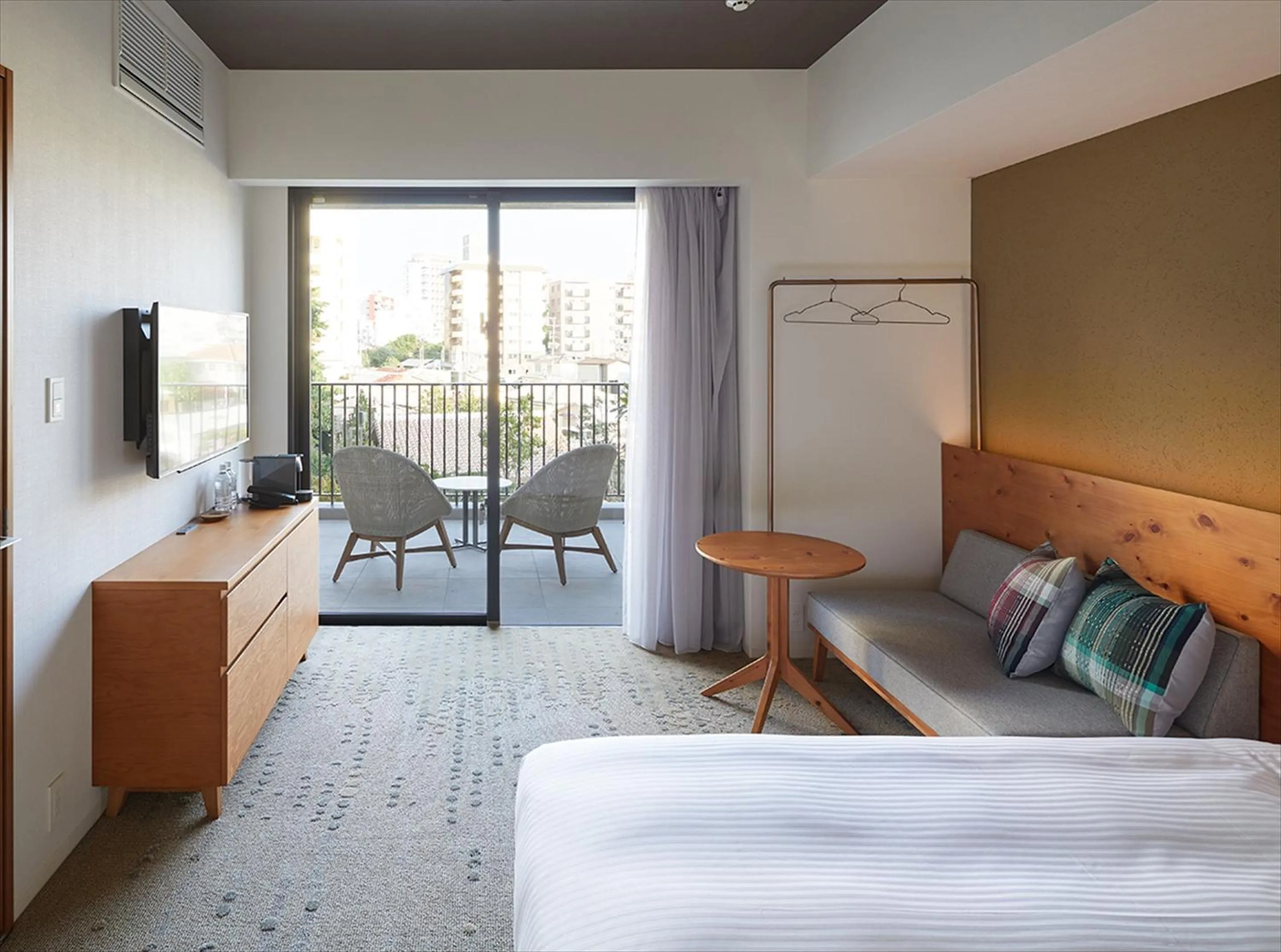 Balcony/Terrace, Bed in HOTEL STRATA NAHA