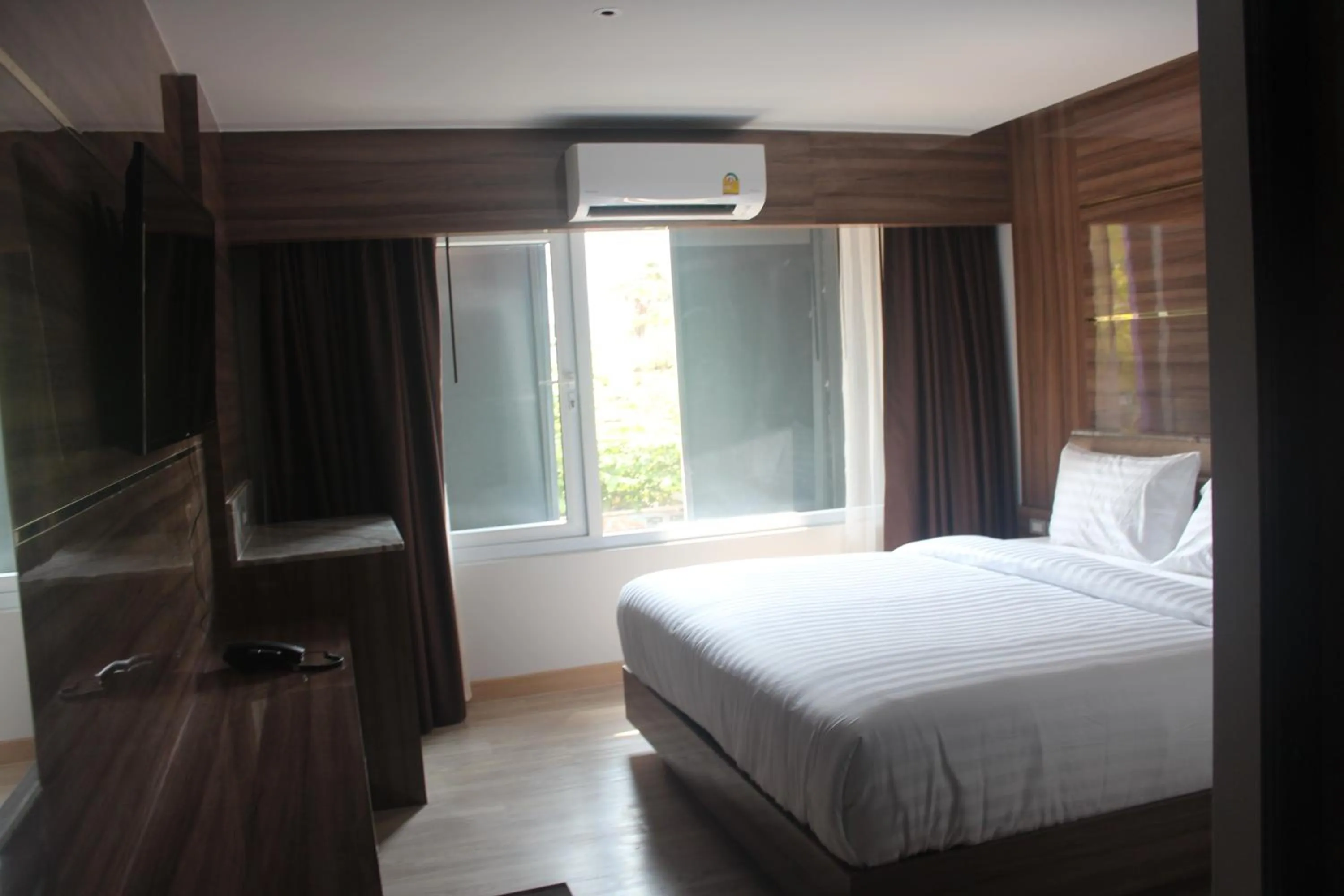 Bed in H-District Boutique Poshotel