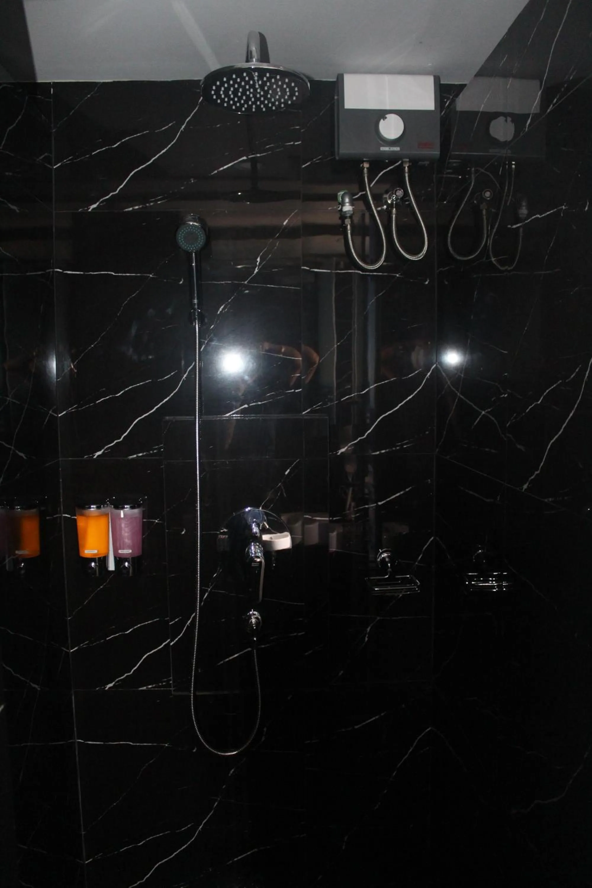 Shower in H-District Boutique Poshotel