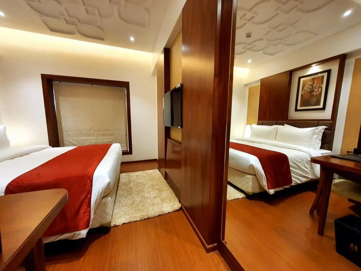 Bed in Hotel MBC Citadel Nashik