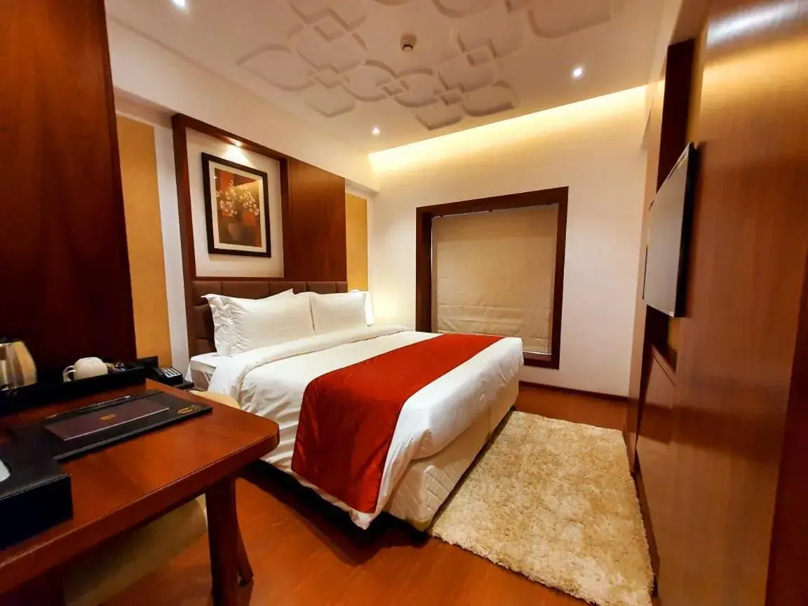 Bed in Hotel MBC Citadel Nashik Bed in Hotel MBC Citadel Nashik