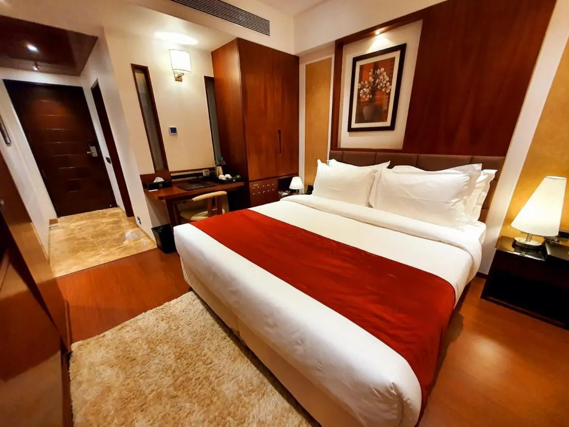 Bed in Hotel MBC Citadel Nashik