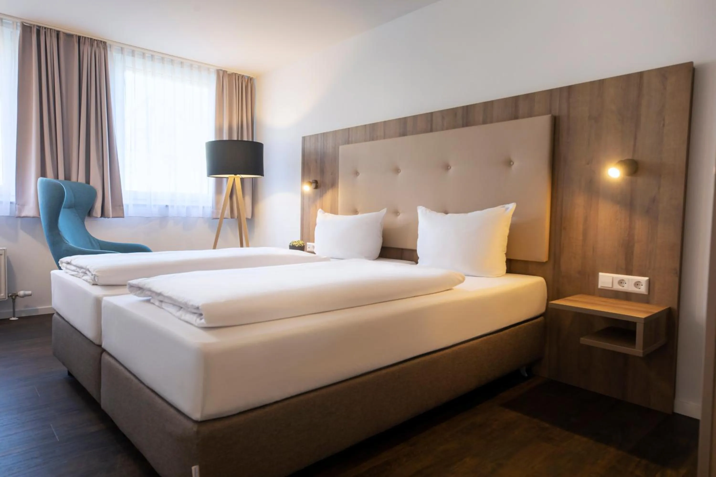 Photo of the whole room, Bed in ACHAT Hotel Stuttgart Zuffenhausen