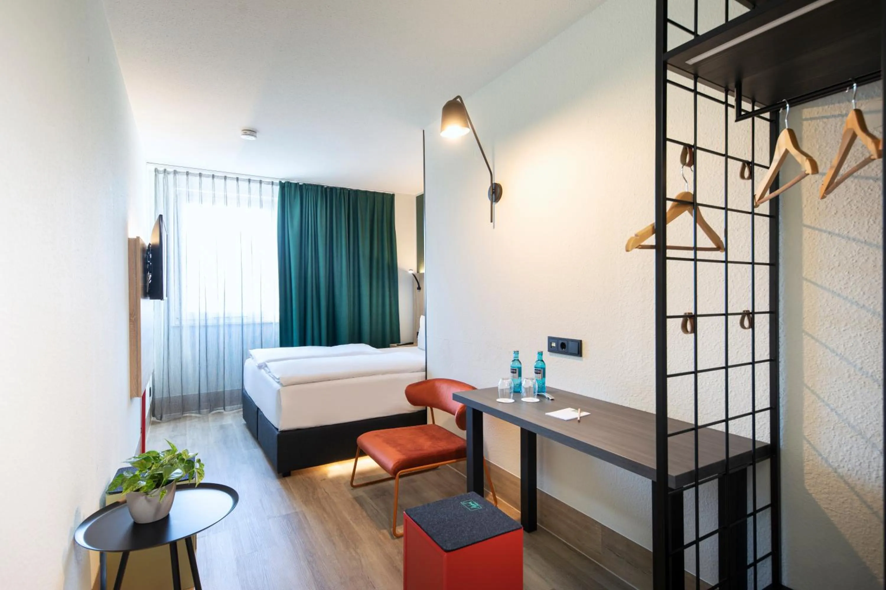 Photo of the whole room, Bed in ACHAT Hotel Stuttgart Zuffenhausen