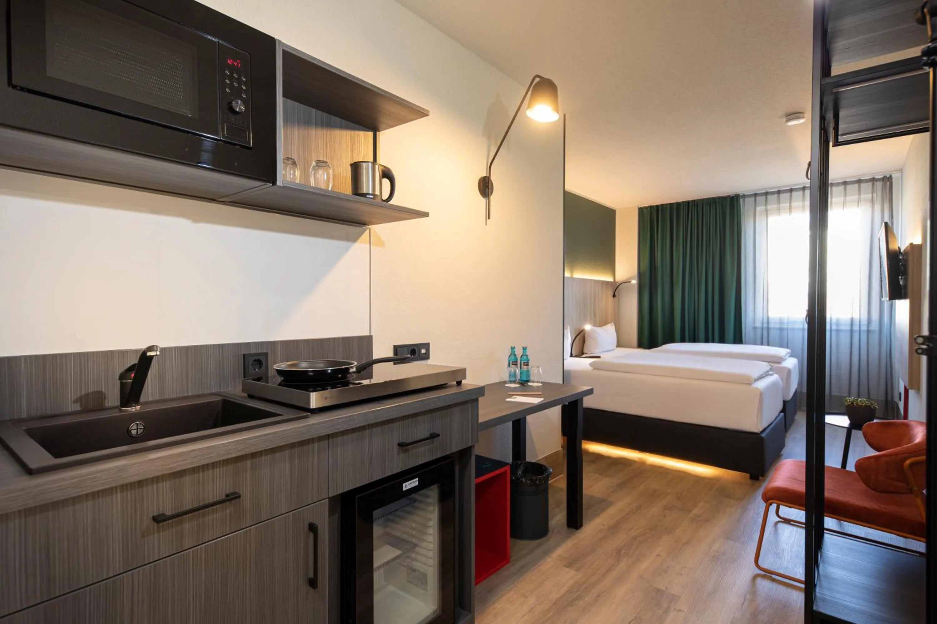 Photo of the whole room, Bed in ACHAT Hotel Stuttgart Zuffenhausen