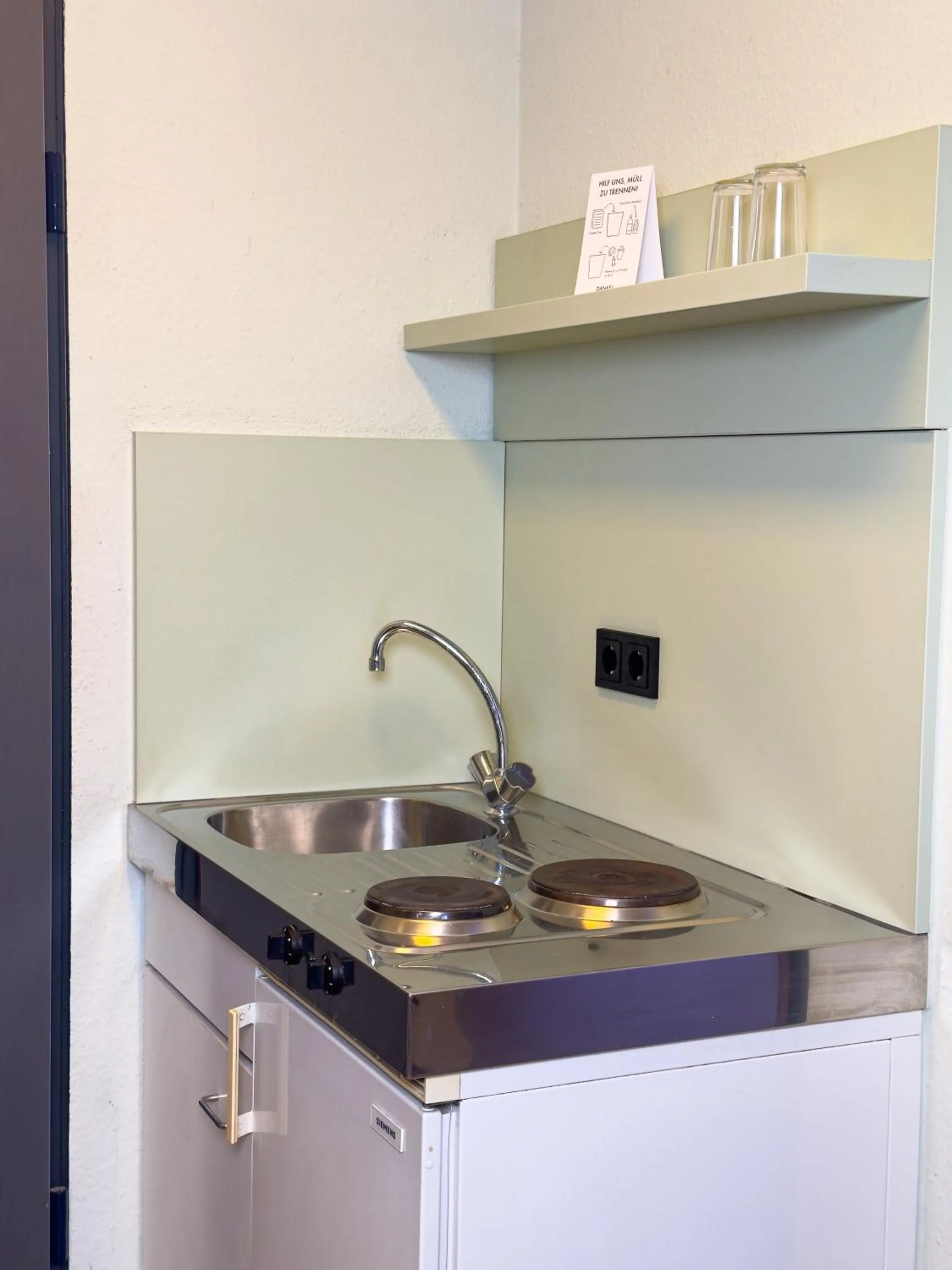 Kitchen or kitchenette in ACHAT Hotel Frankfurt Airport