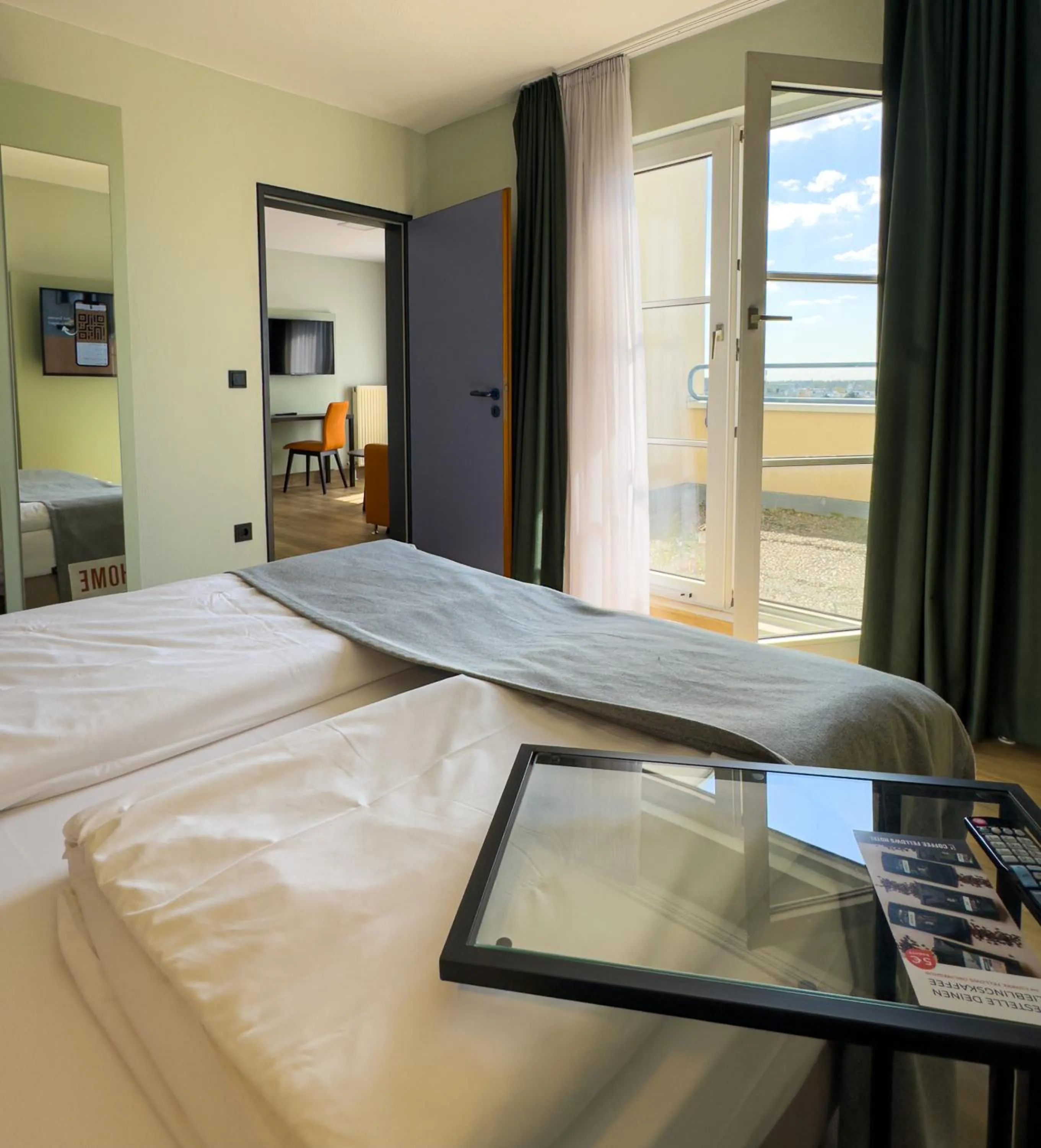 Photo of the whole room, Bed in ACHAT Hotel Frankfurt Airport