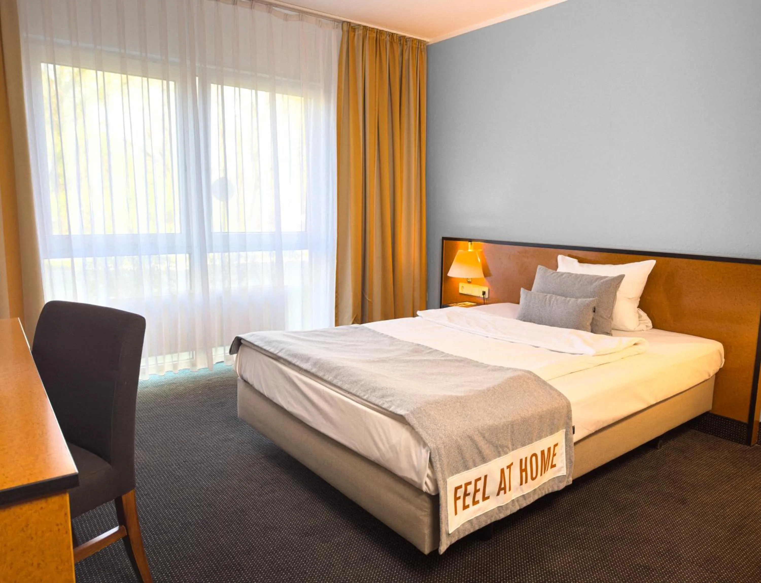 Photo of the whole room, Bed in ACHAT Hotel Frankfurt Airport