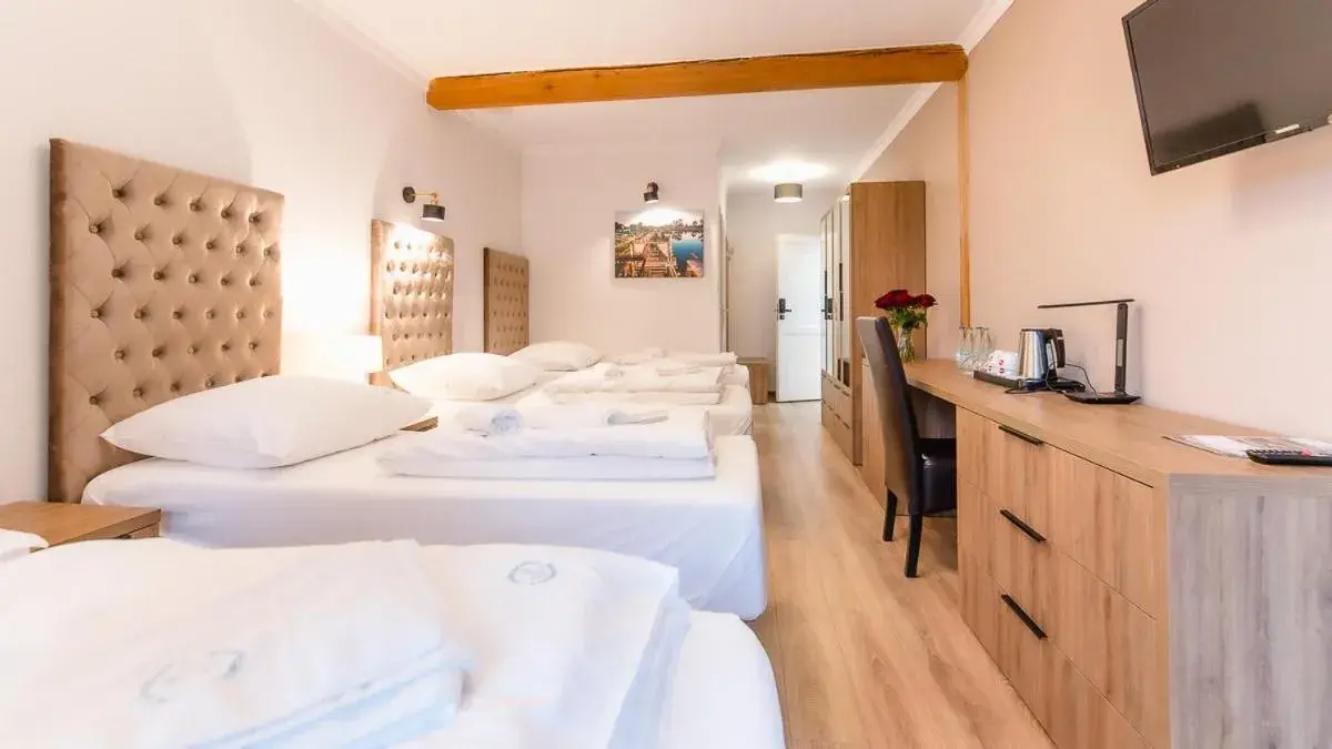 Quadruple Room with Garden View in Apartamenty Kapitańskie Quadruple Room with Garden View in Apartamenty Kapitańskie