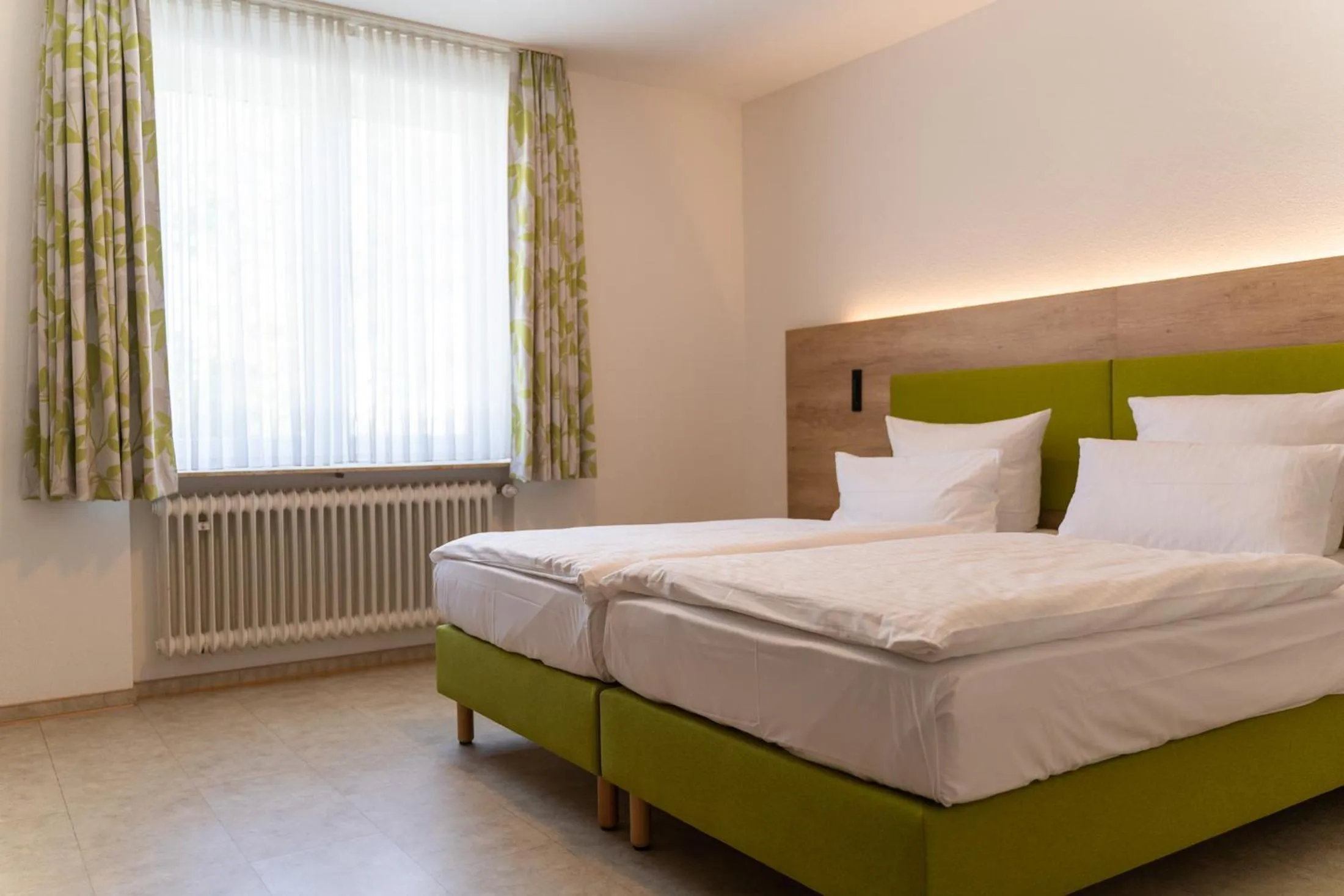 Bed in Hotel Bergschlößchen