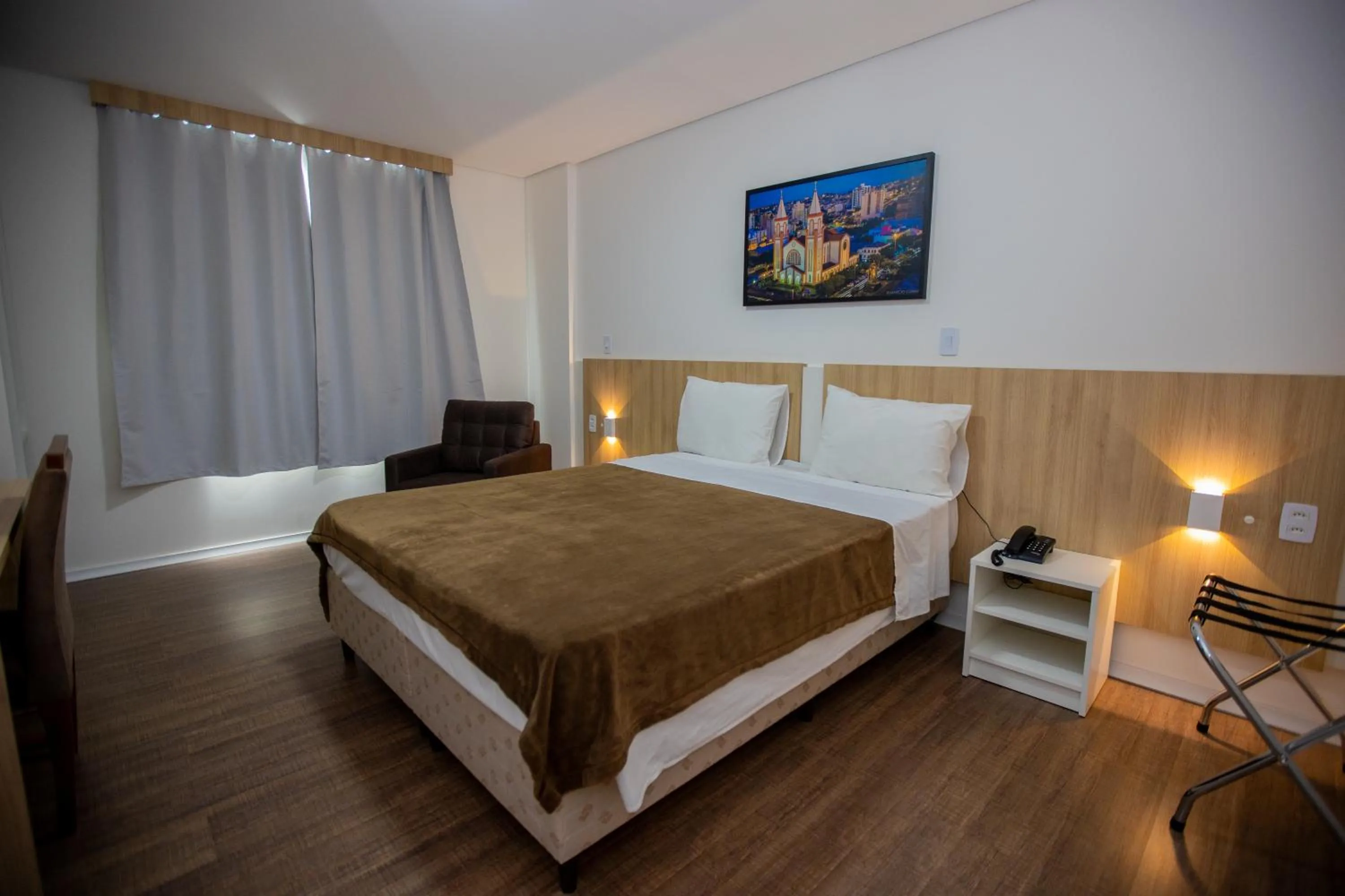 Bed in Tri Hotel Chapecó