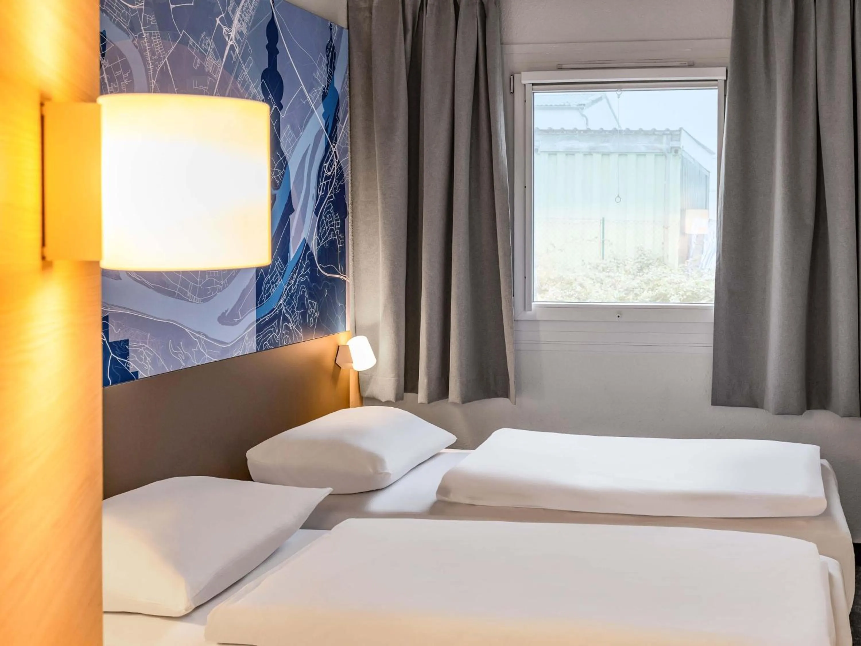 Photo of the whole room, Bed in B&B HOTEL Koblenz-Nord