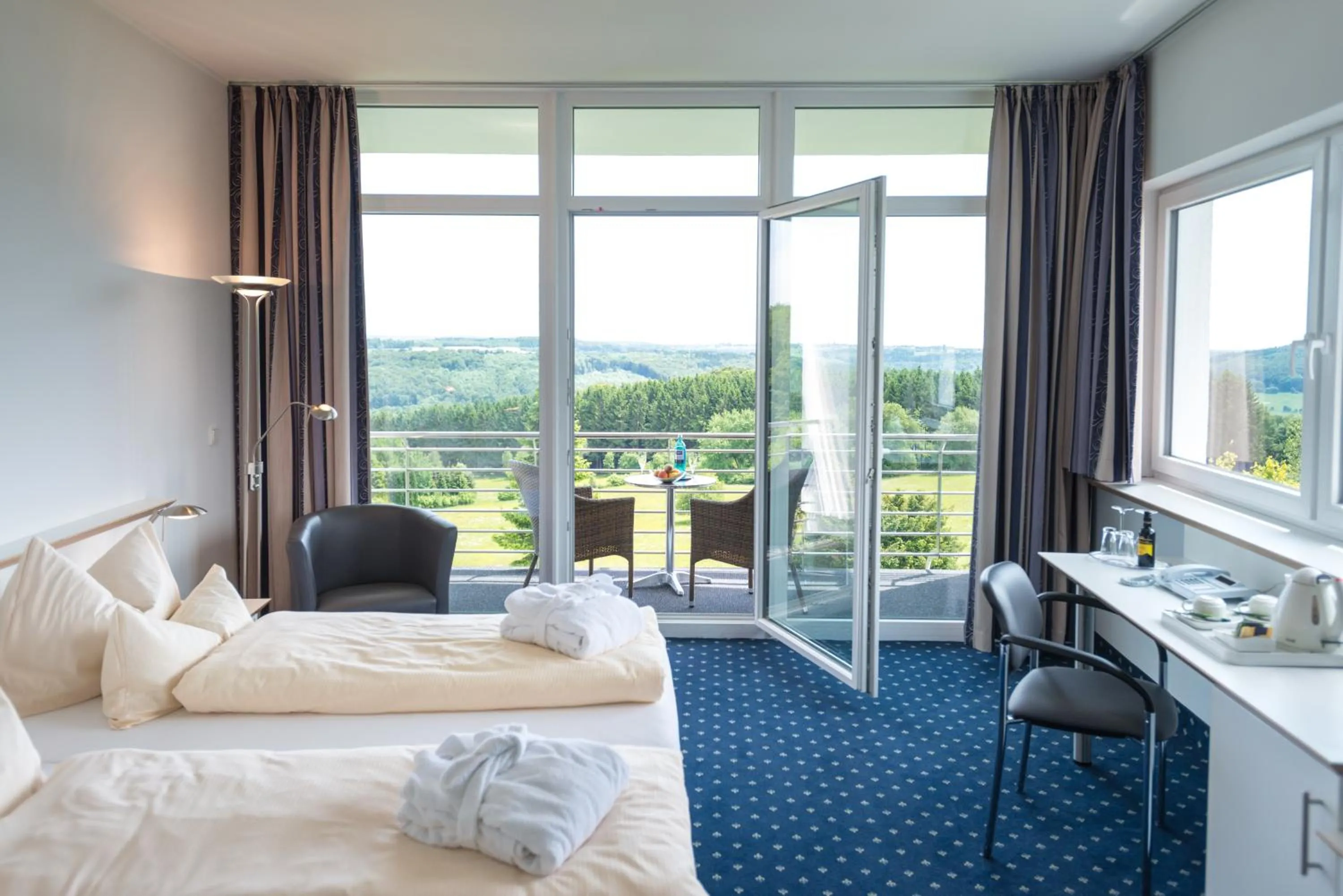 Photo of the whole room, Bed in Wildpark Hotel