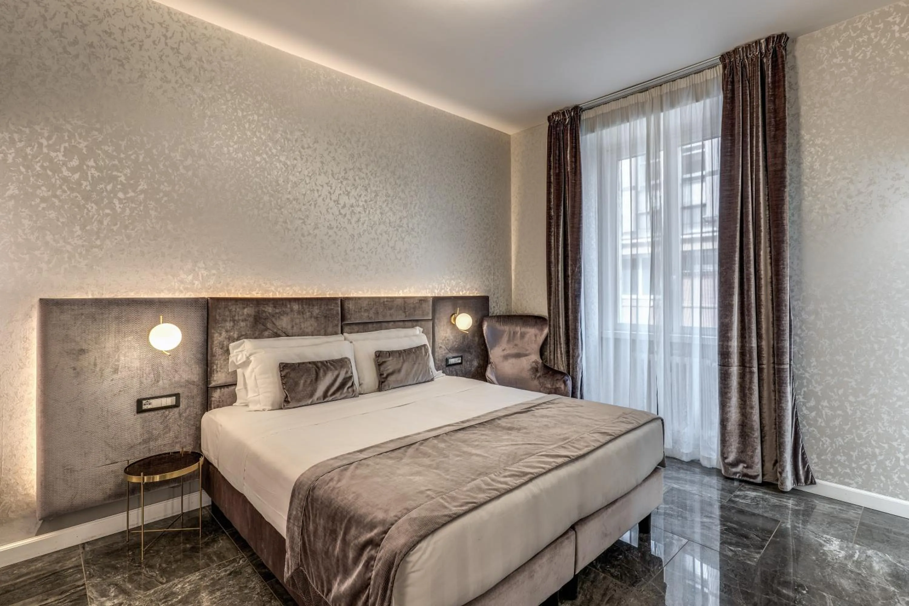 Bed in Apollo Boutique Hotel