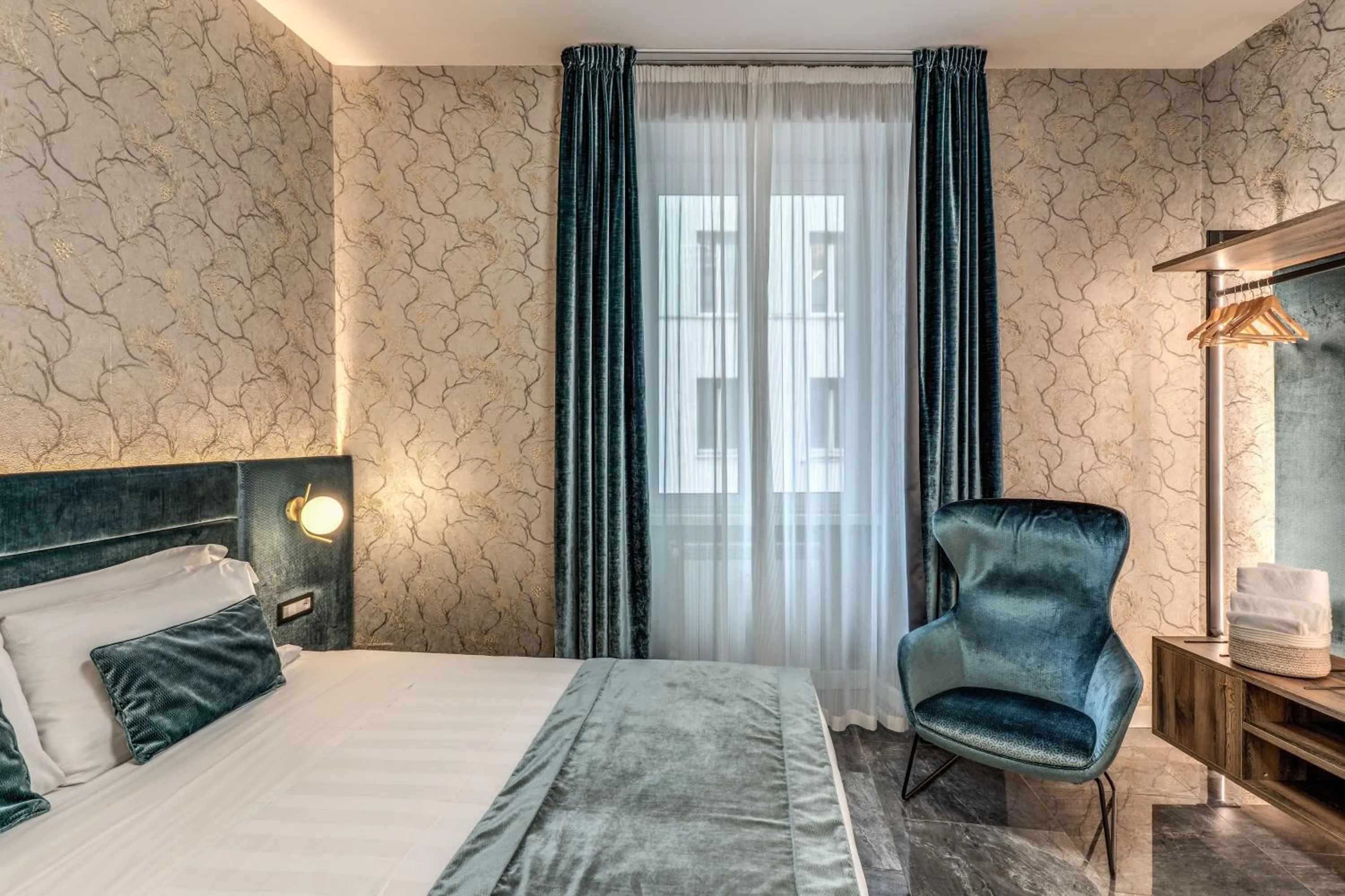 Bed in Apollo Boutique Hotel