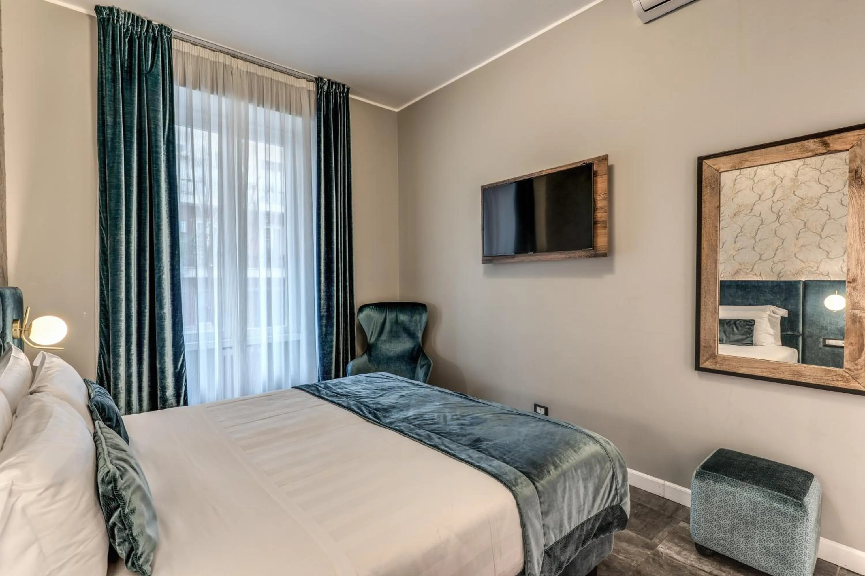 Bed in Apollo Boutique Hotel