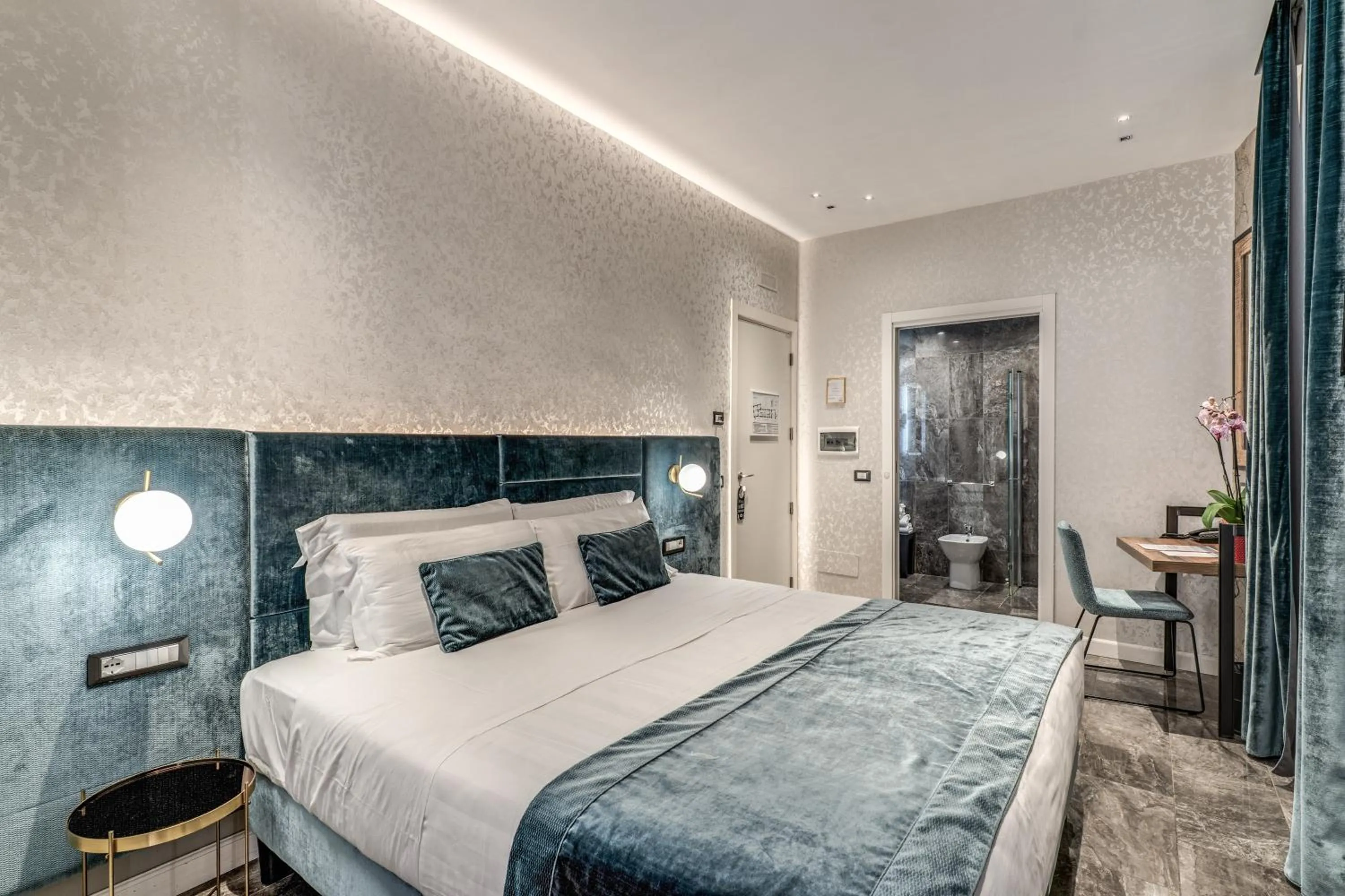 Bed in Apollo Boutique Hotel