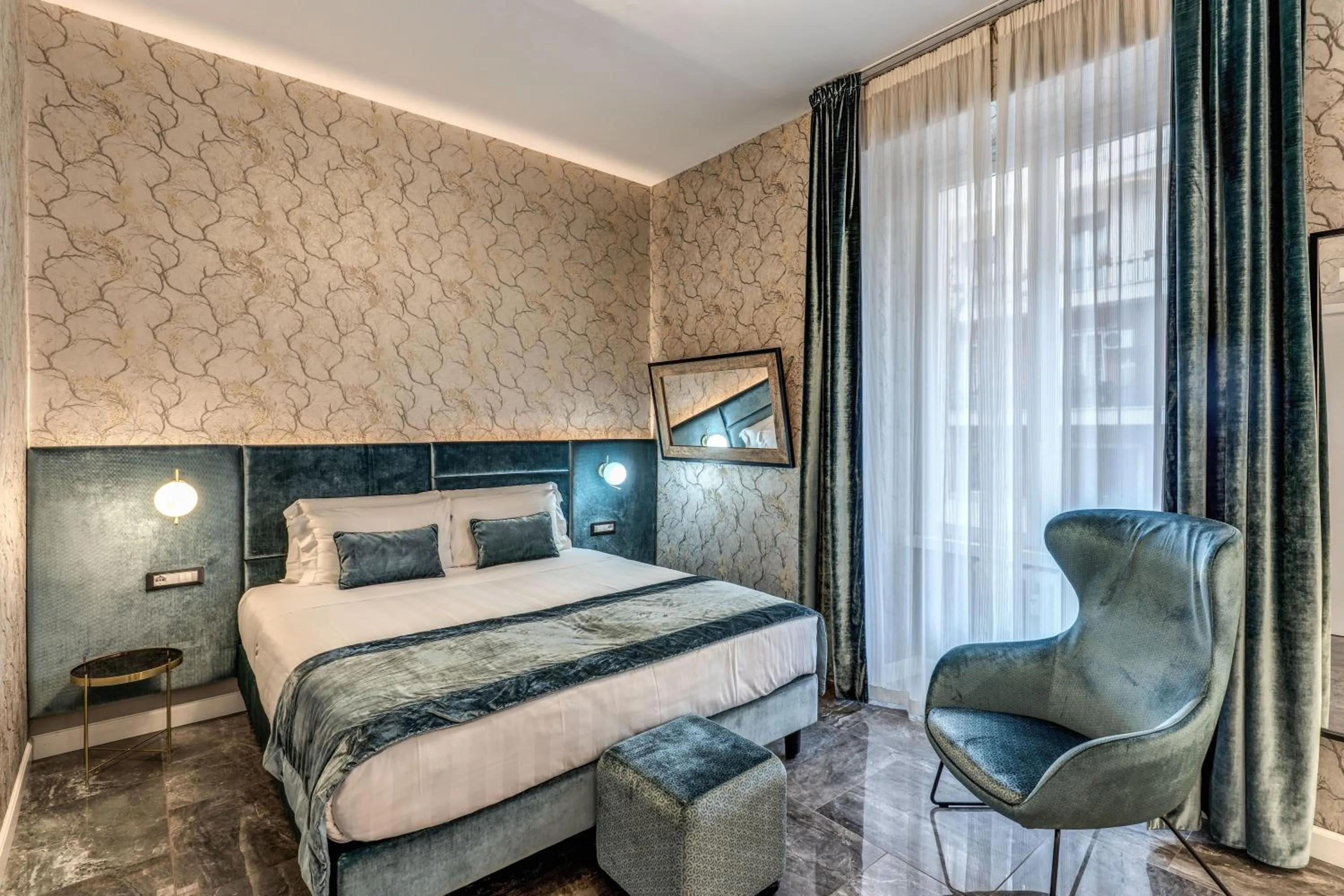 Bed in Apollo Boutique Hotel