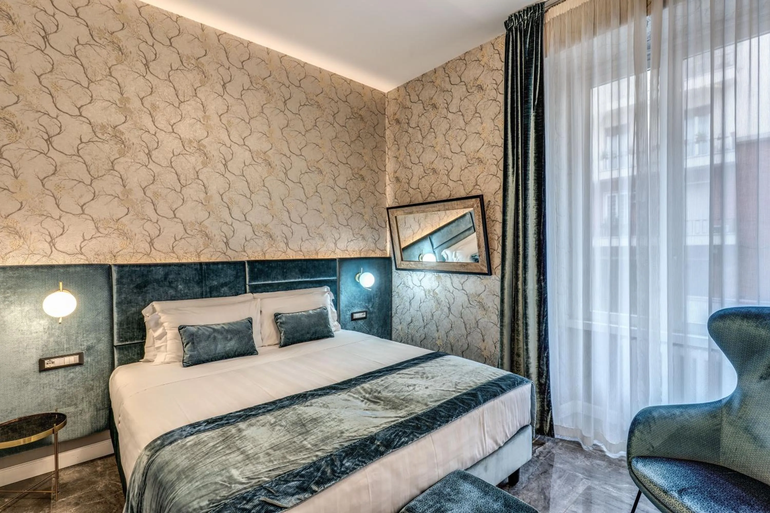 Bed in Apollo Boutique Hotel