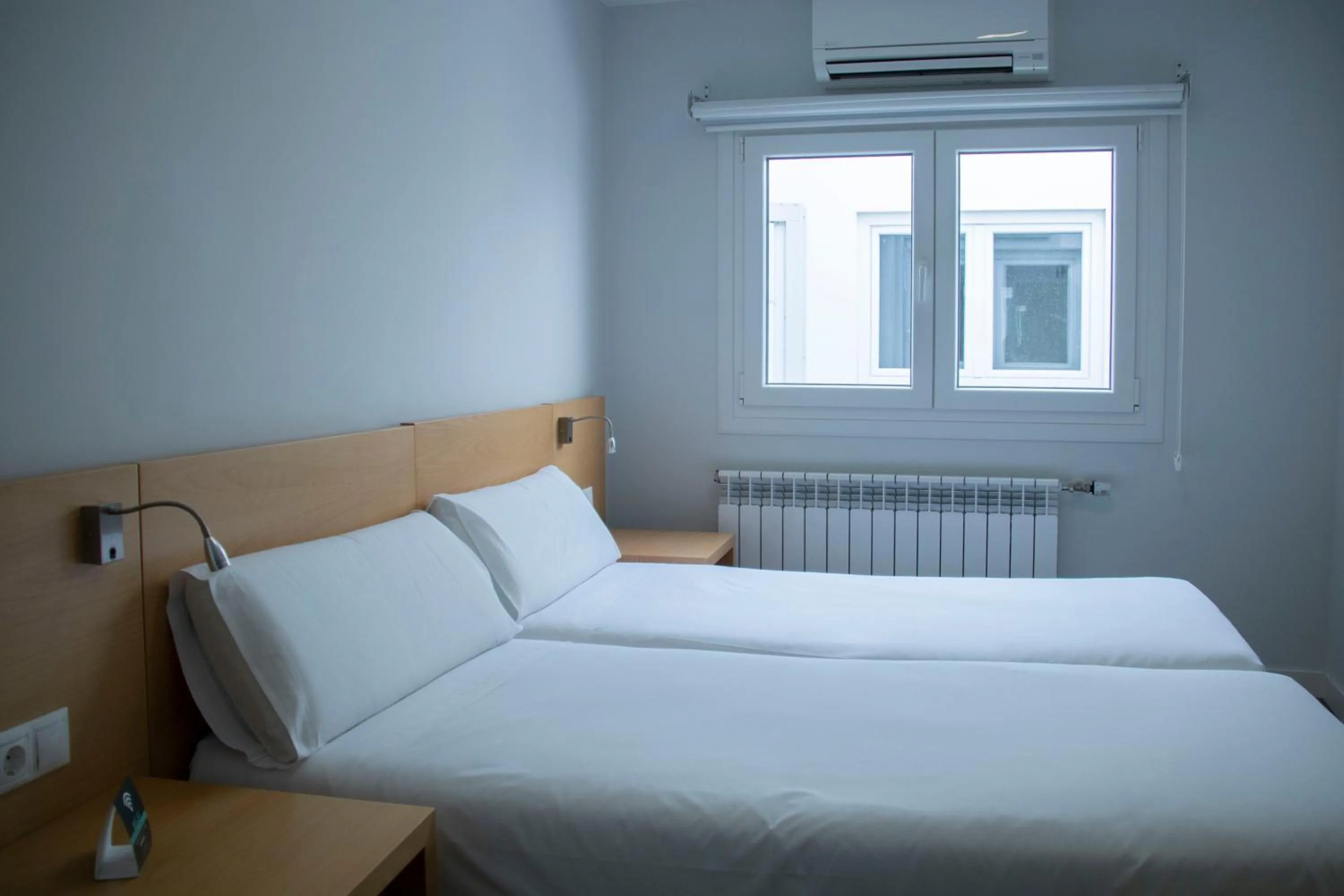 Bed in Alda Alborán Rooms