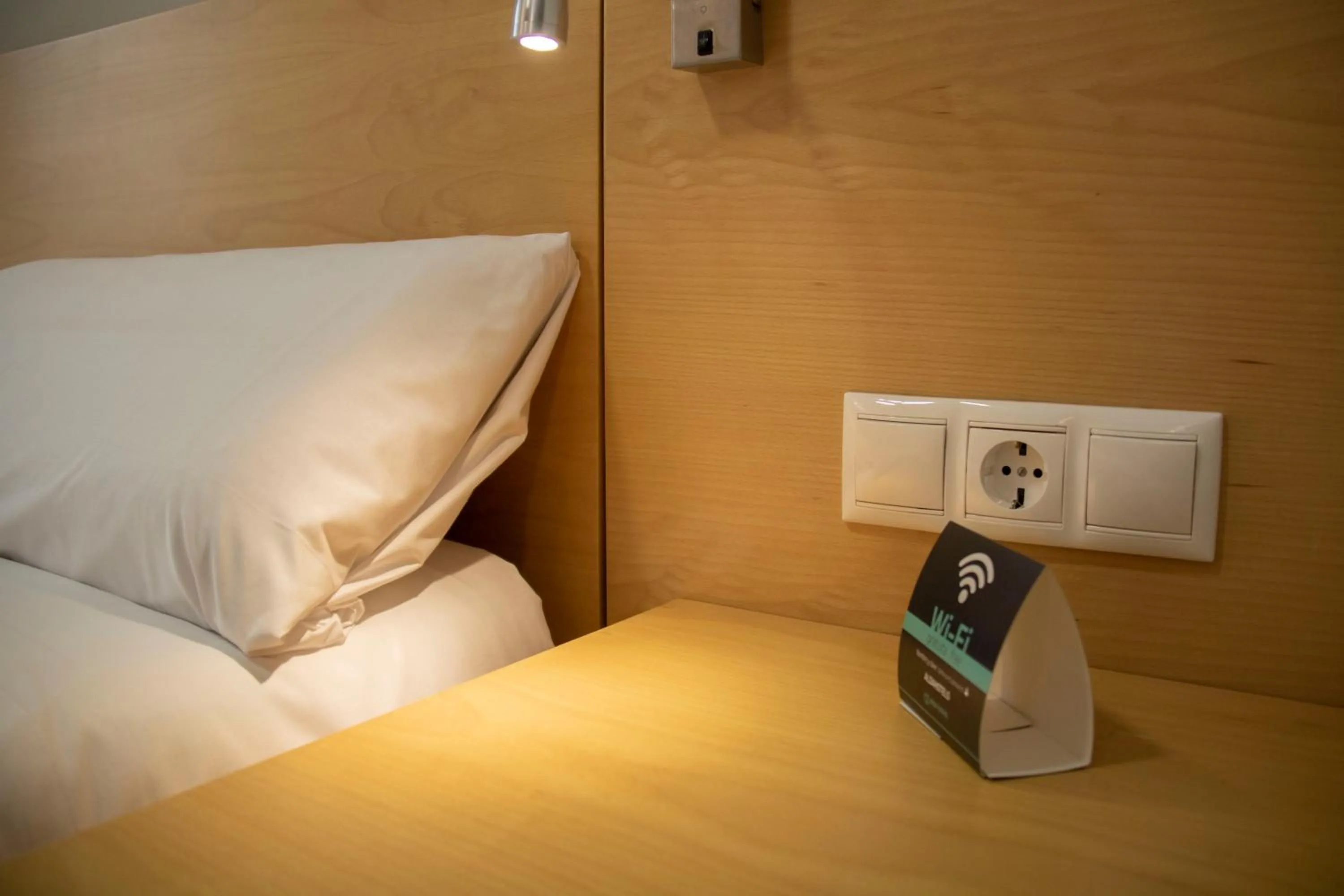 Bed in Alda Alborán Rooms