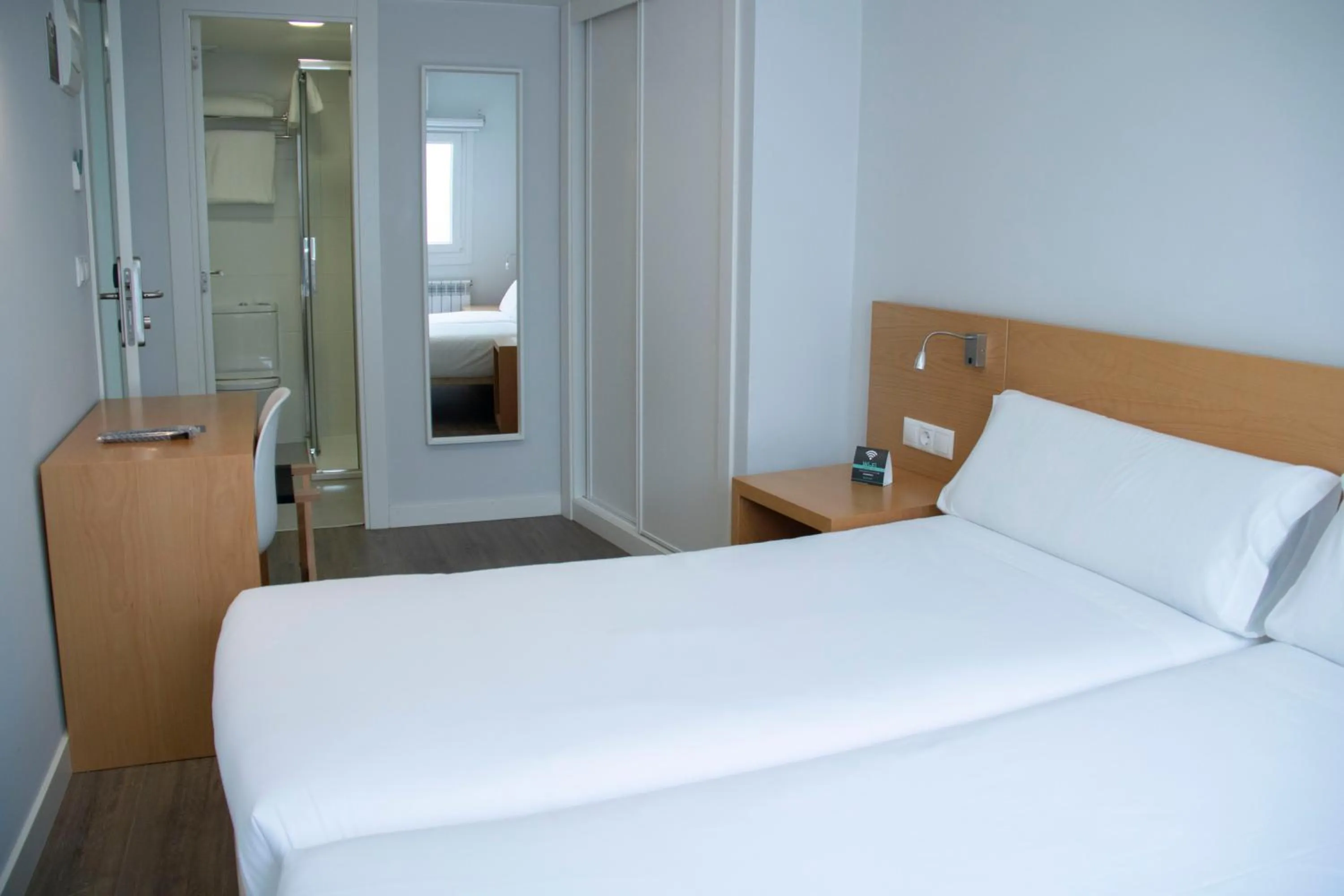 Bed in Alda Alborán Rooms