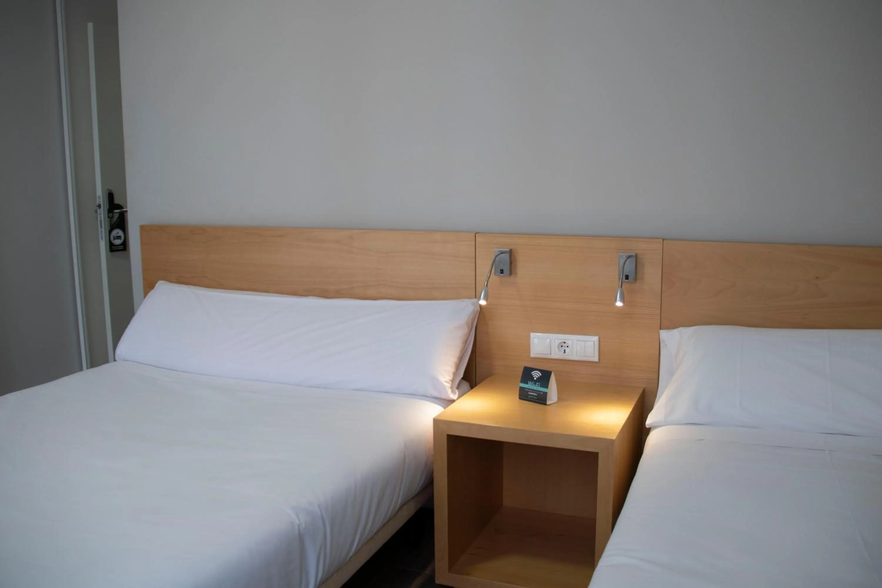 Bed in Alda Alborán Rooms