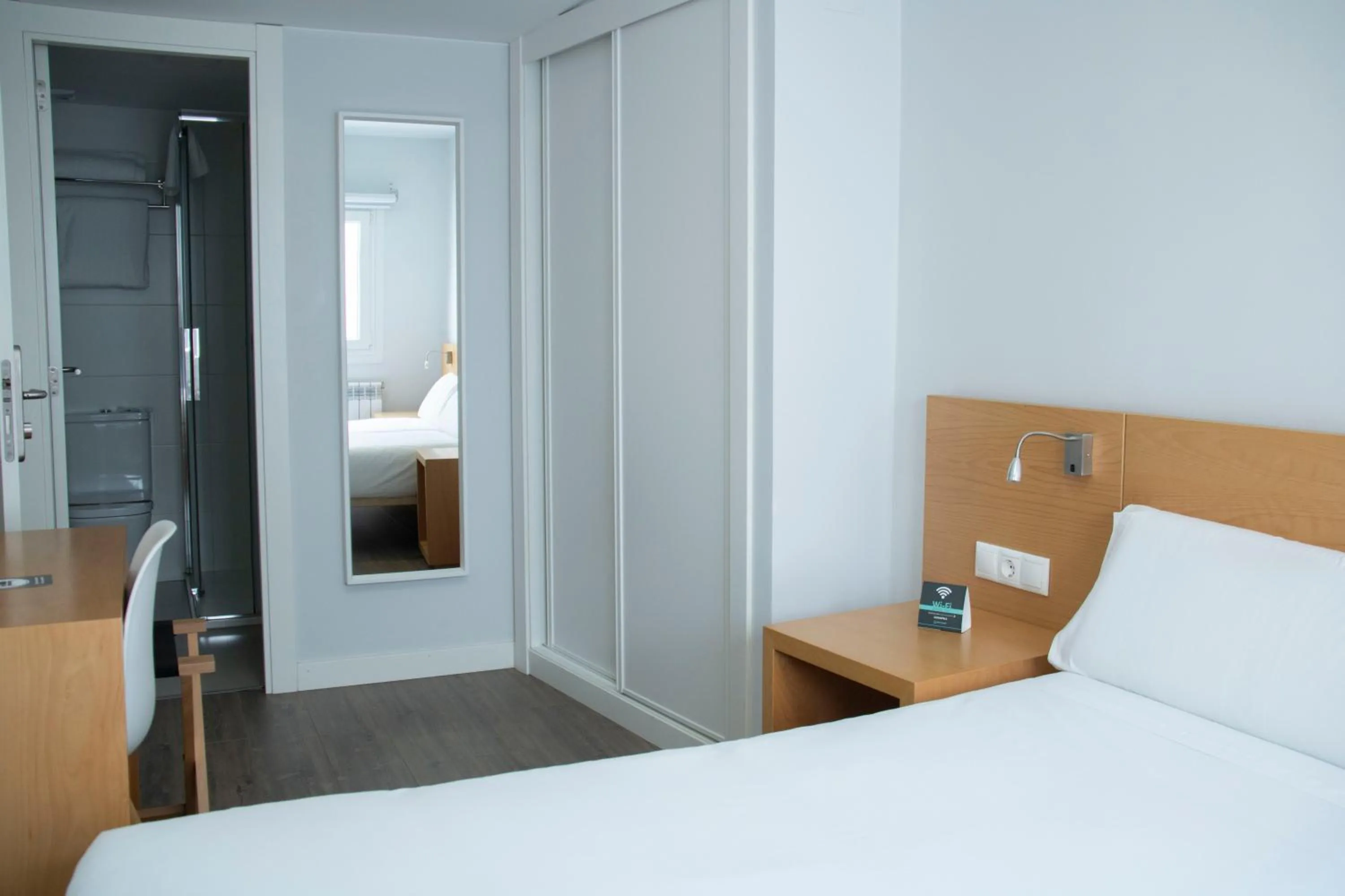 Bed in Alda Alborán Rooms