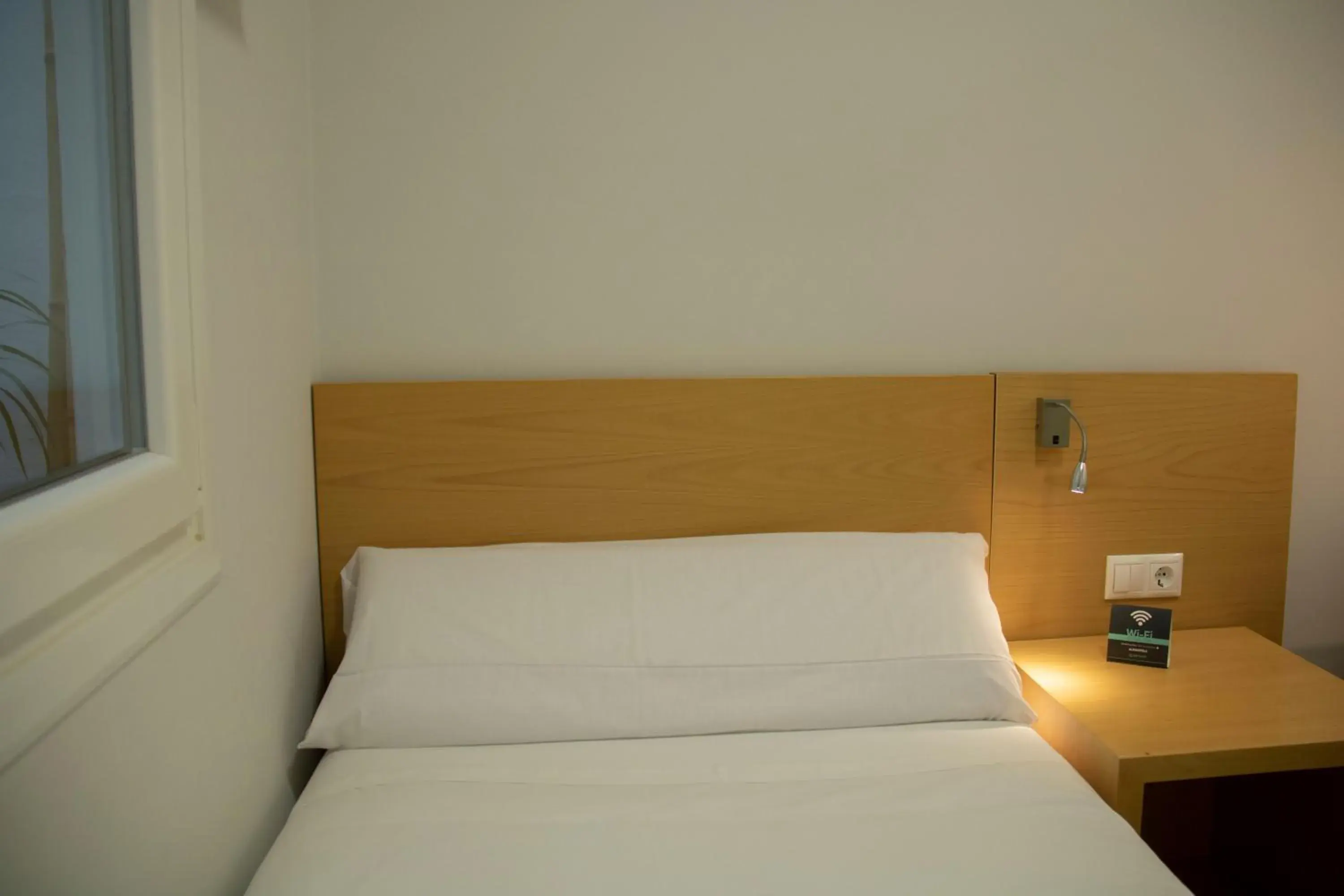 Bed in Alda Alborán Rooms Bed in Alda Alborán Rooms